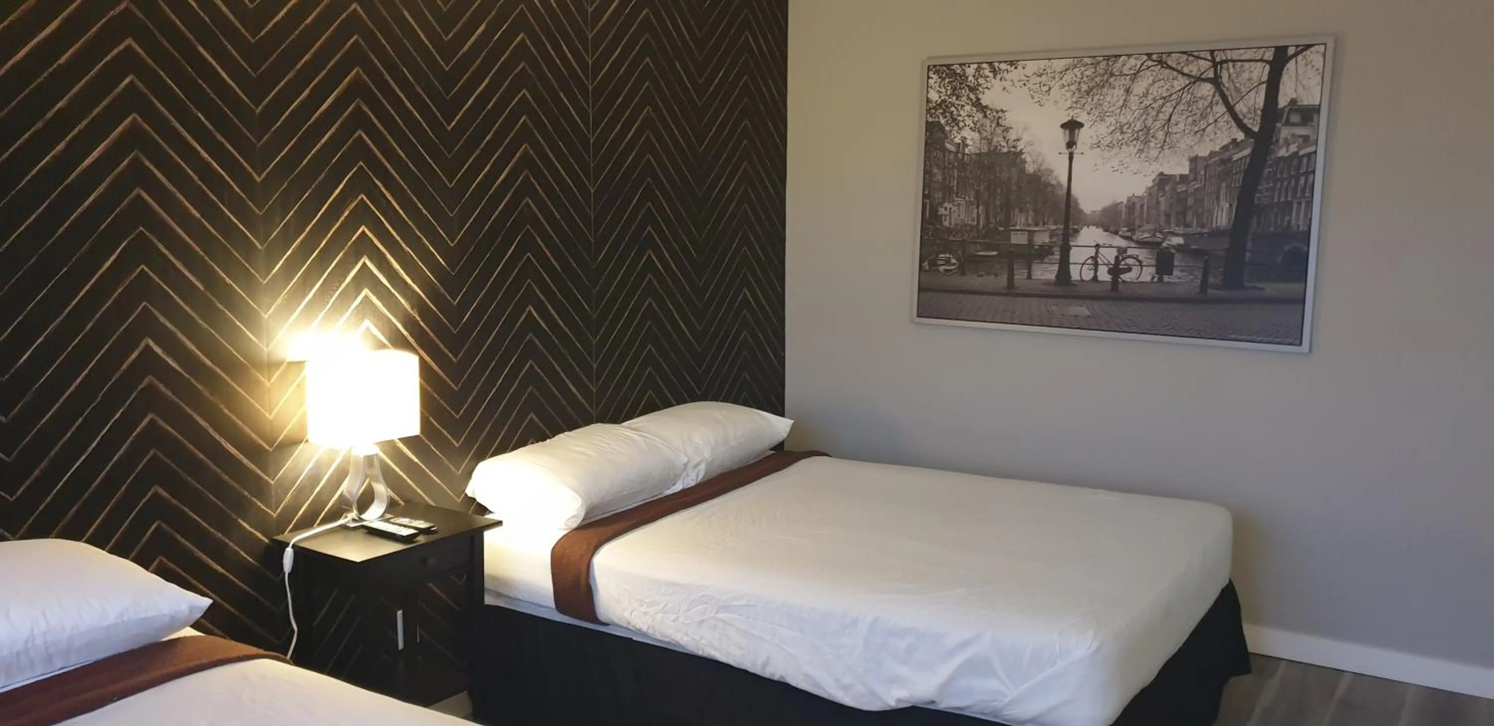 Bed in New Frontier Hotel