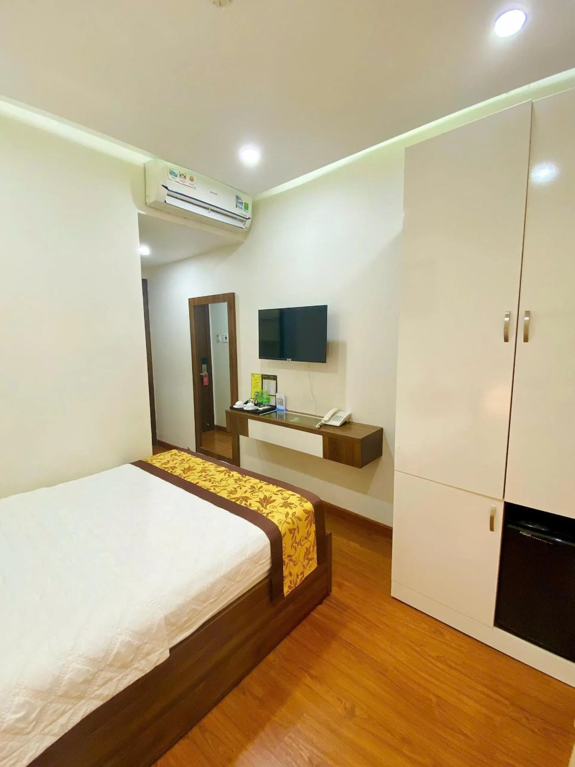 Bed in GOLD CITY Hotel