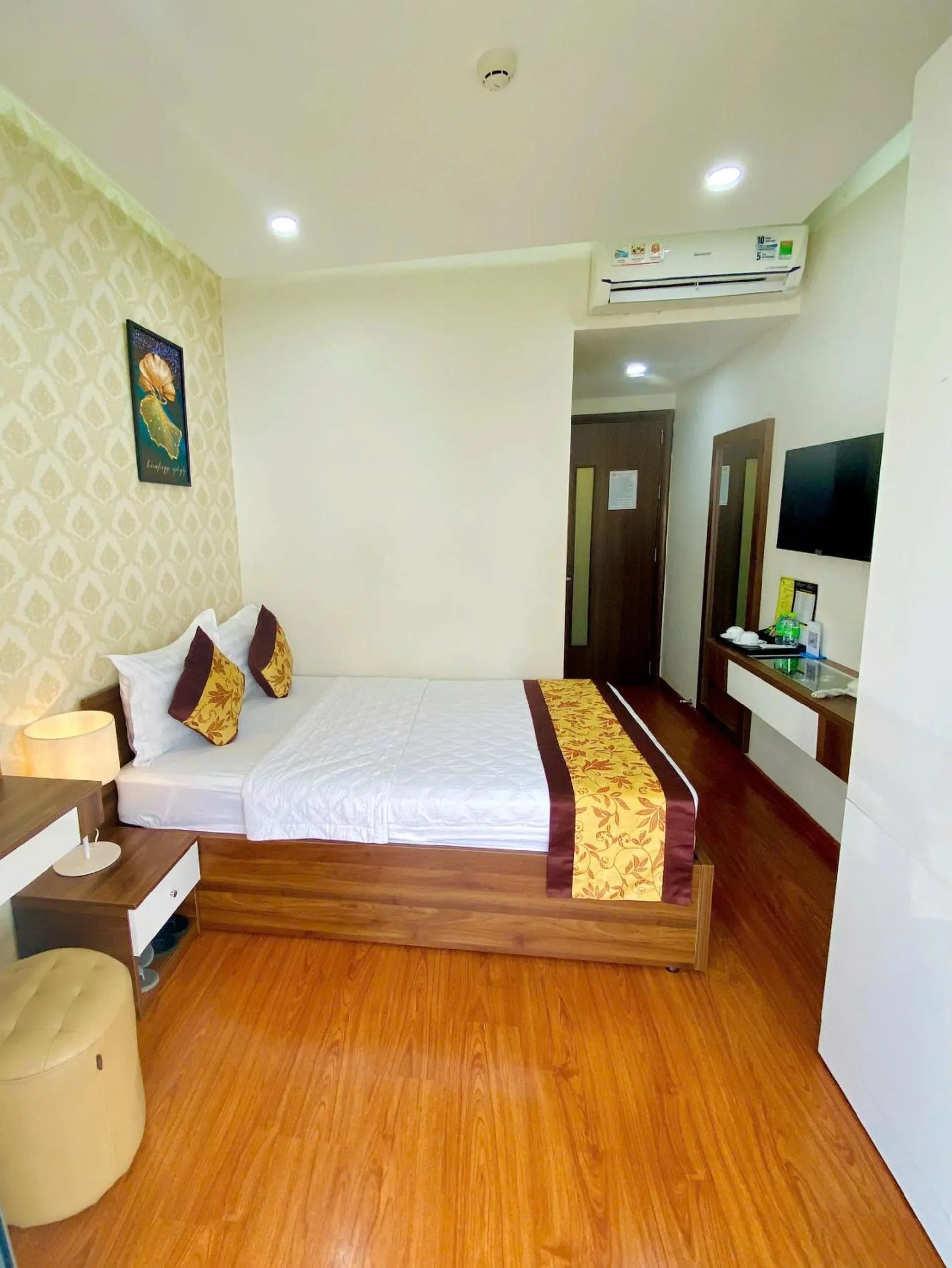 Bed in GOLD CITY Hotel