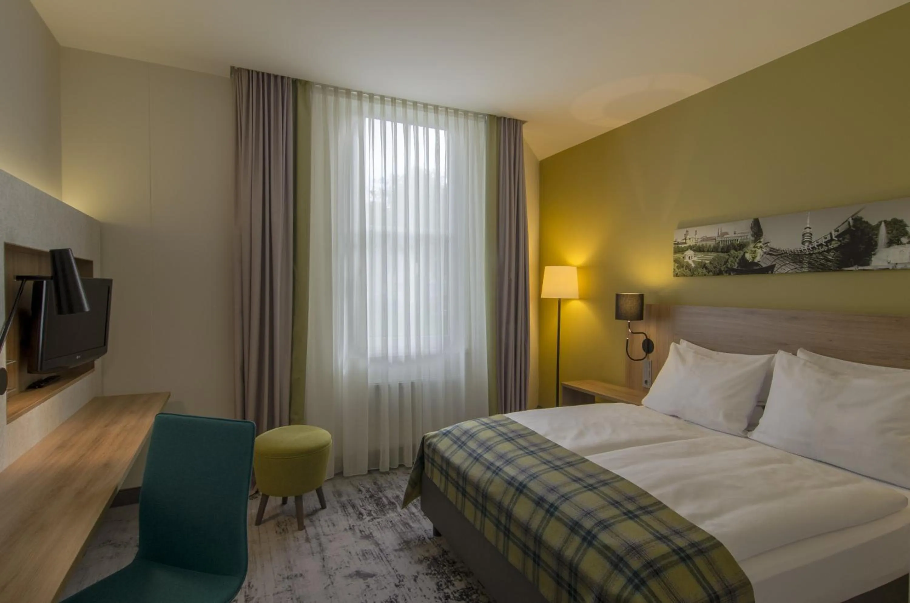 Photo of the whole room, Bed in Holiday Inn Munich Unterhaching by IHG