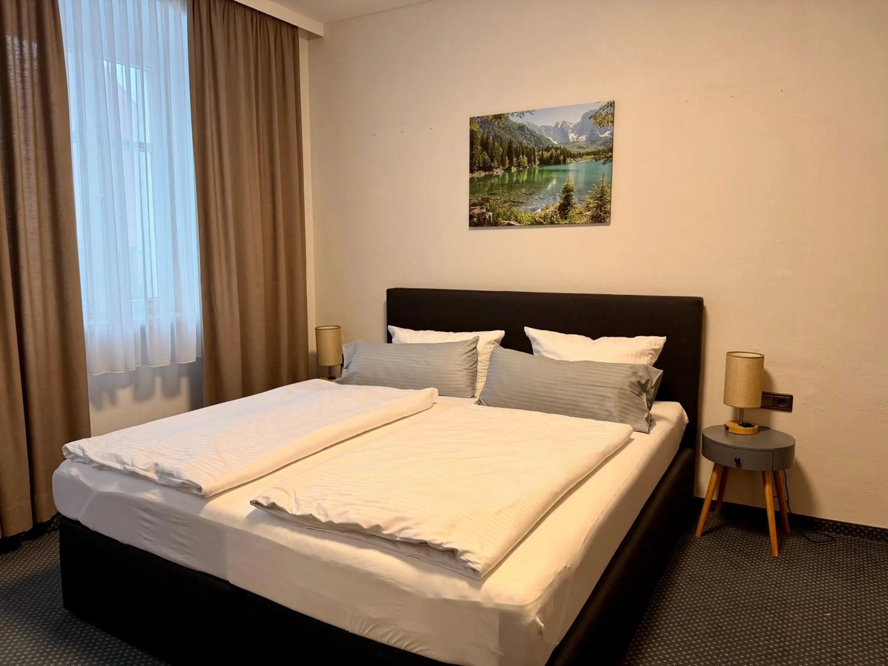 Bed in Gasthof Hotel Bräustübl und Haus Boutique