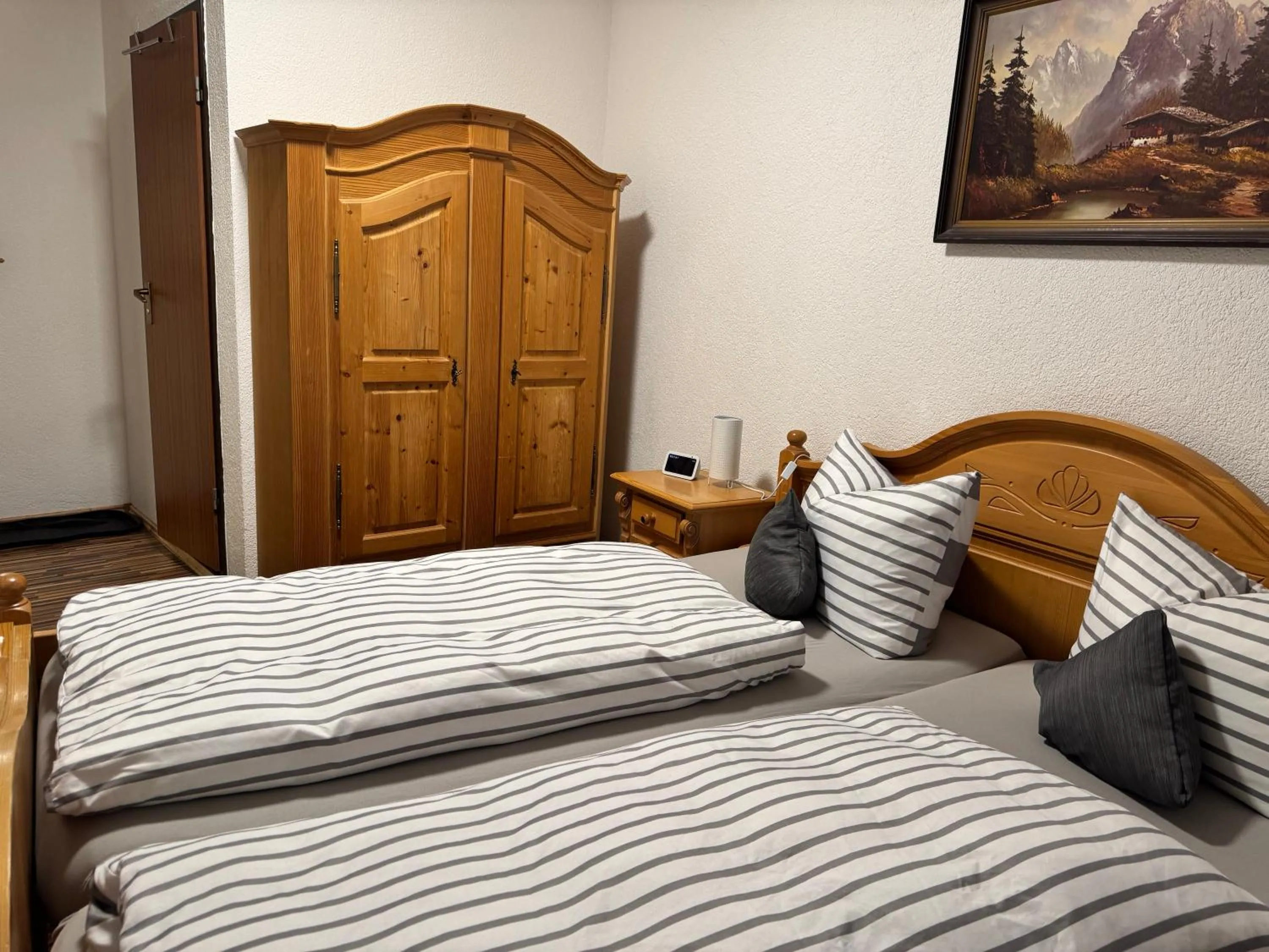 Photo of the whole room, Bed in Gasthof Hotel Bräustübl und Haus Boutique