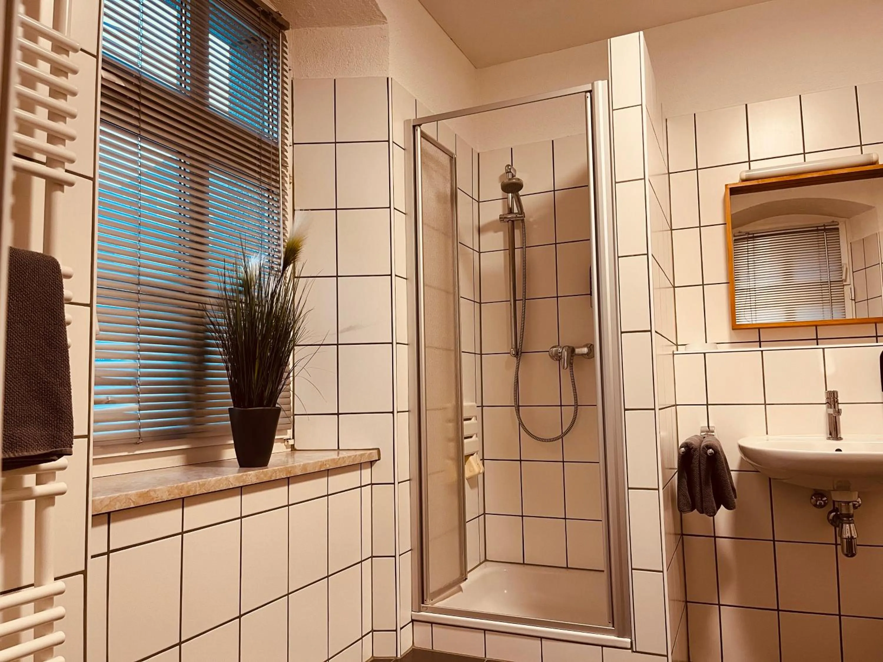 Bathroom in Gasthof Hotel Bräustübl und Haus Boutique