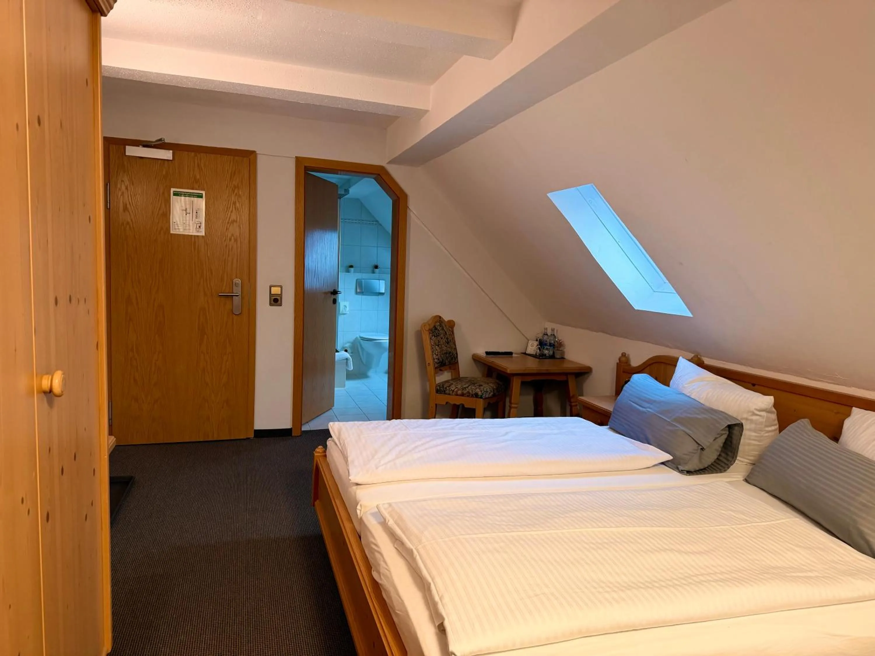 Bed in Gasthof Hotel Bräustübl und Haus Boutique