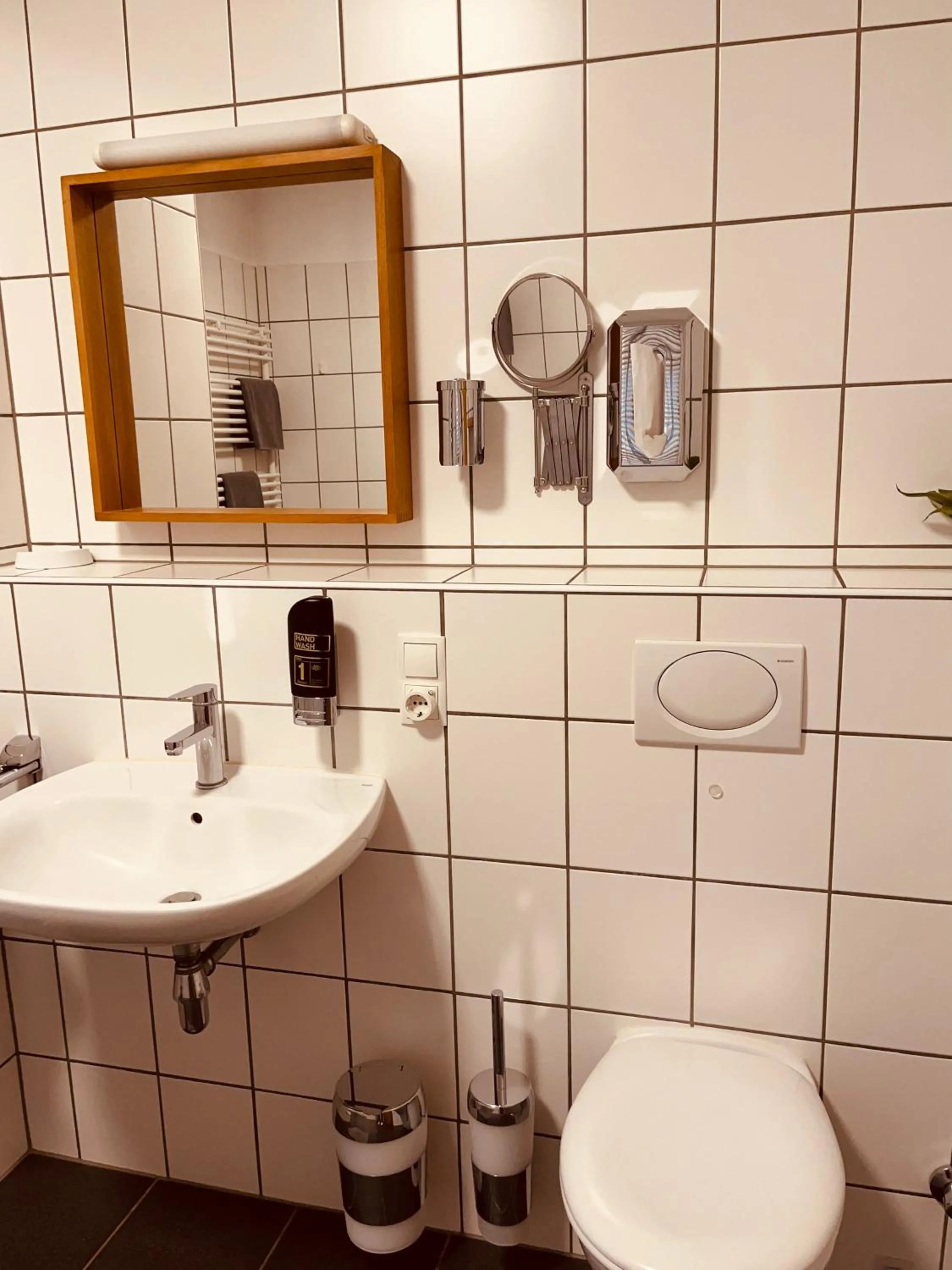 Bathroom in Gasthof Hotel Bräustübl und Haus Boutique