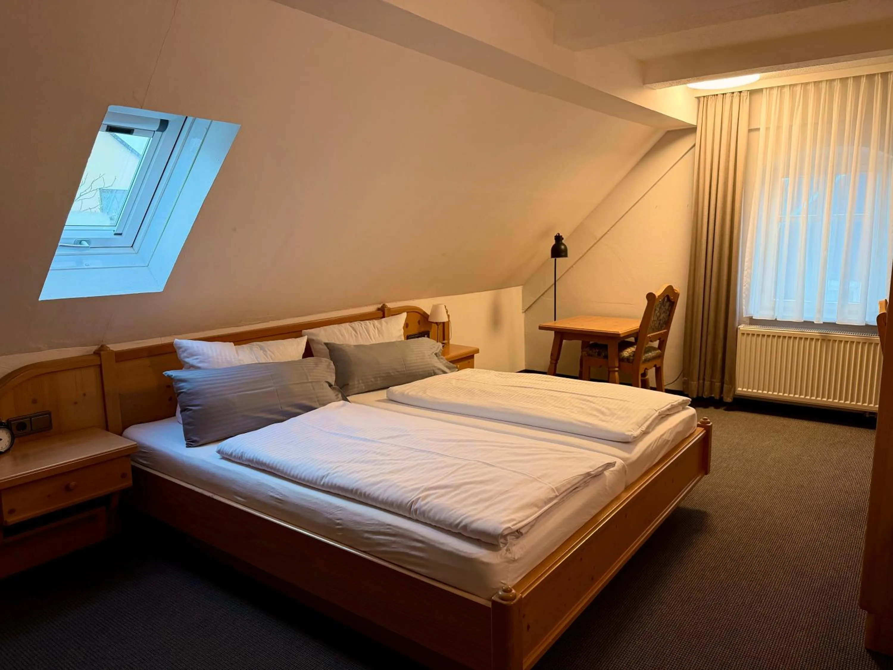 Bed in Gasthof Hotel Bräustübl und Haus Boutique