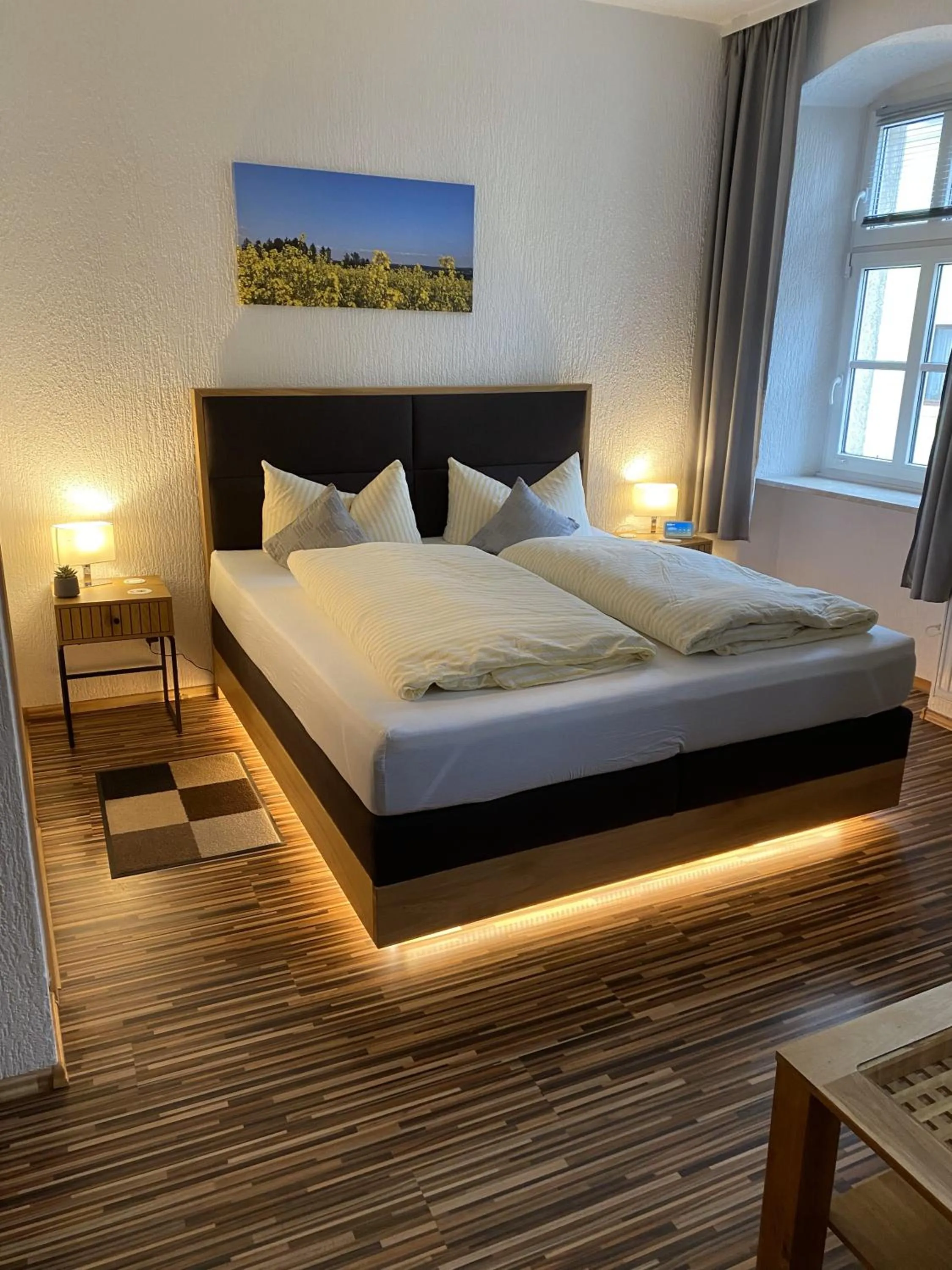 Bed in Gasthof Hotel Bräustübl und Haus Boutique