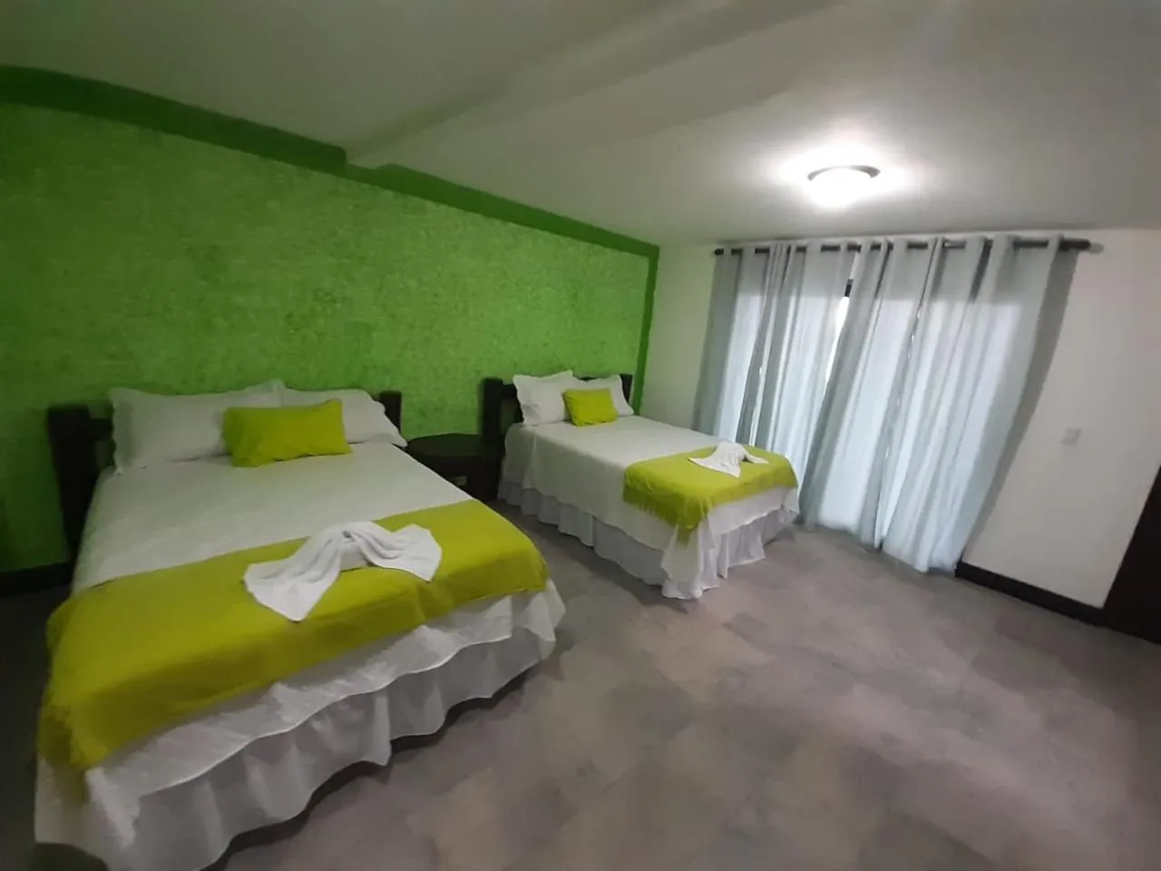 Bed in Hotel Mi Paraíso Río Dulce