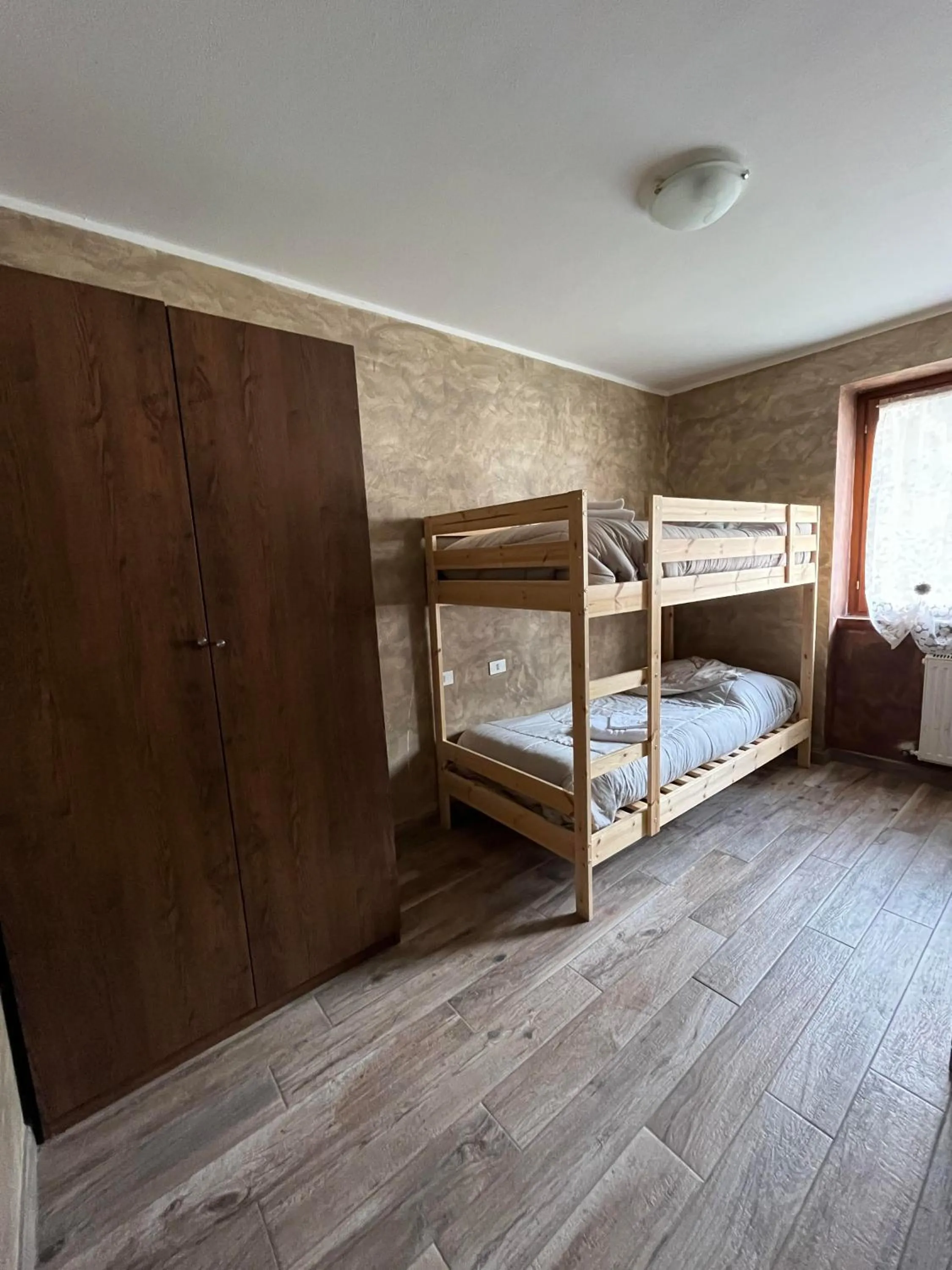 Bed in San Luigi - Rooms & Apartments