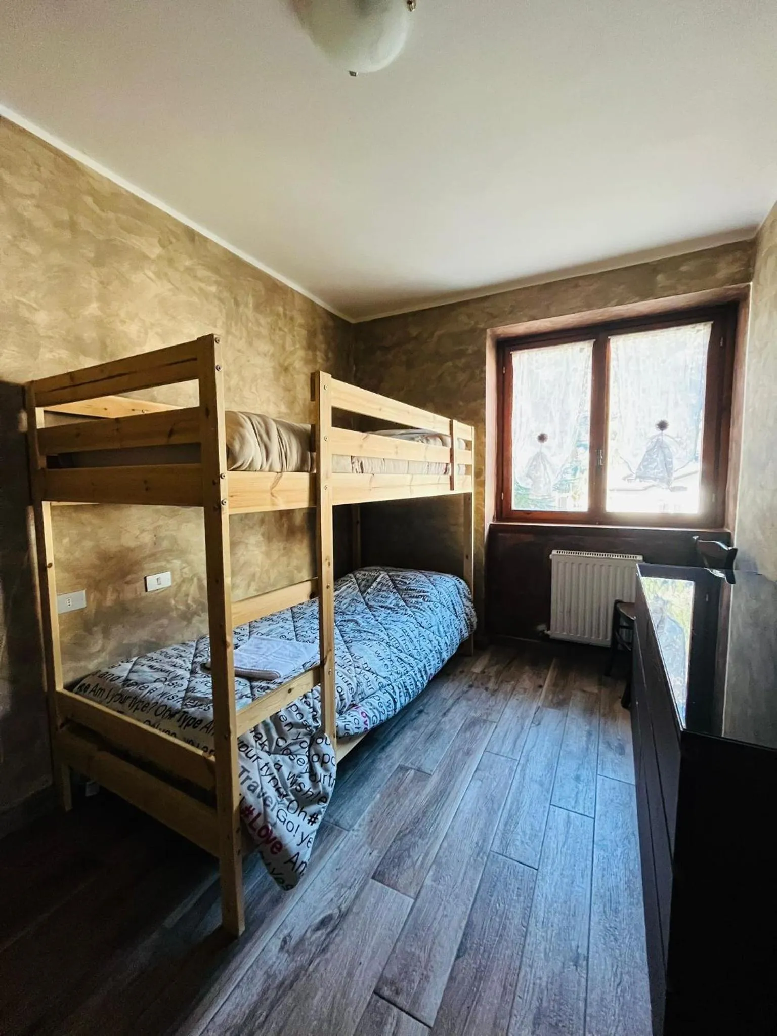 Bed in San Luigi - Rooms & Apartments