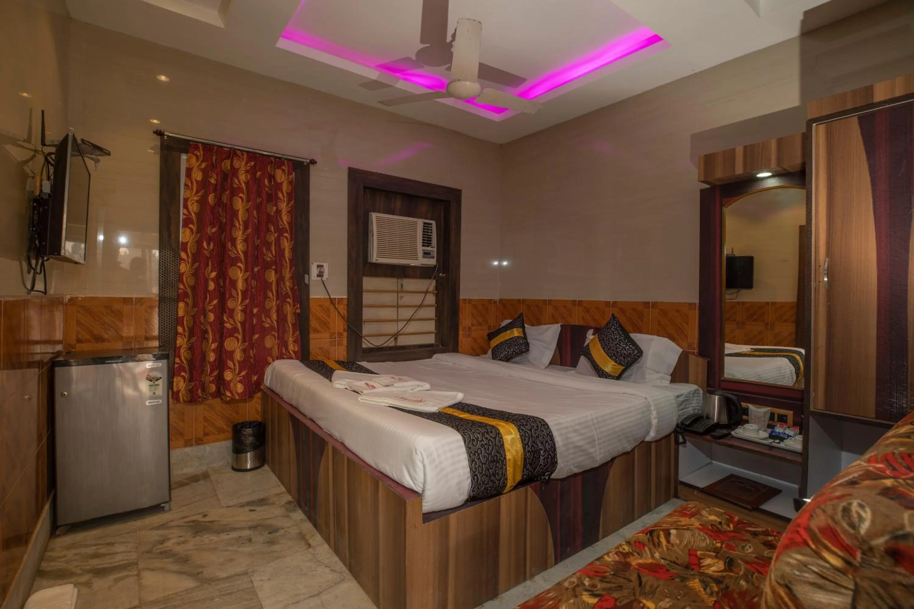 Bed in Snehamaya Spa & Resort