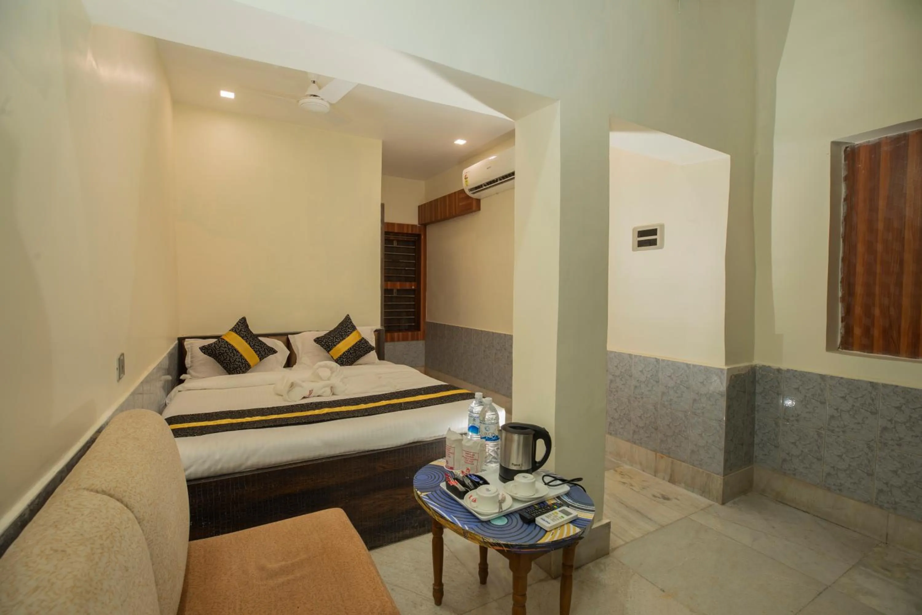 Bed in Snehamaya Spa & Resort