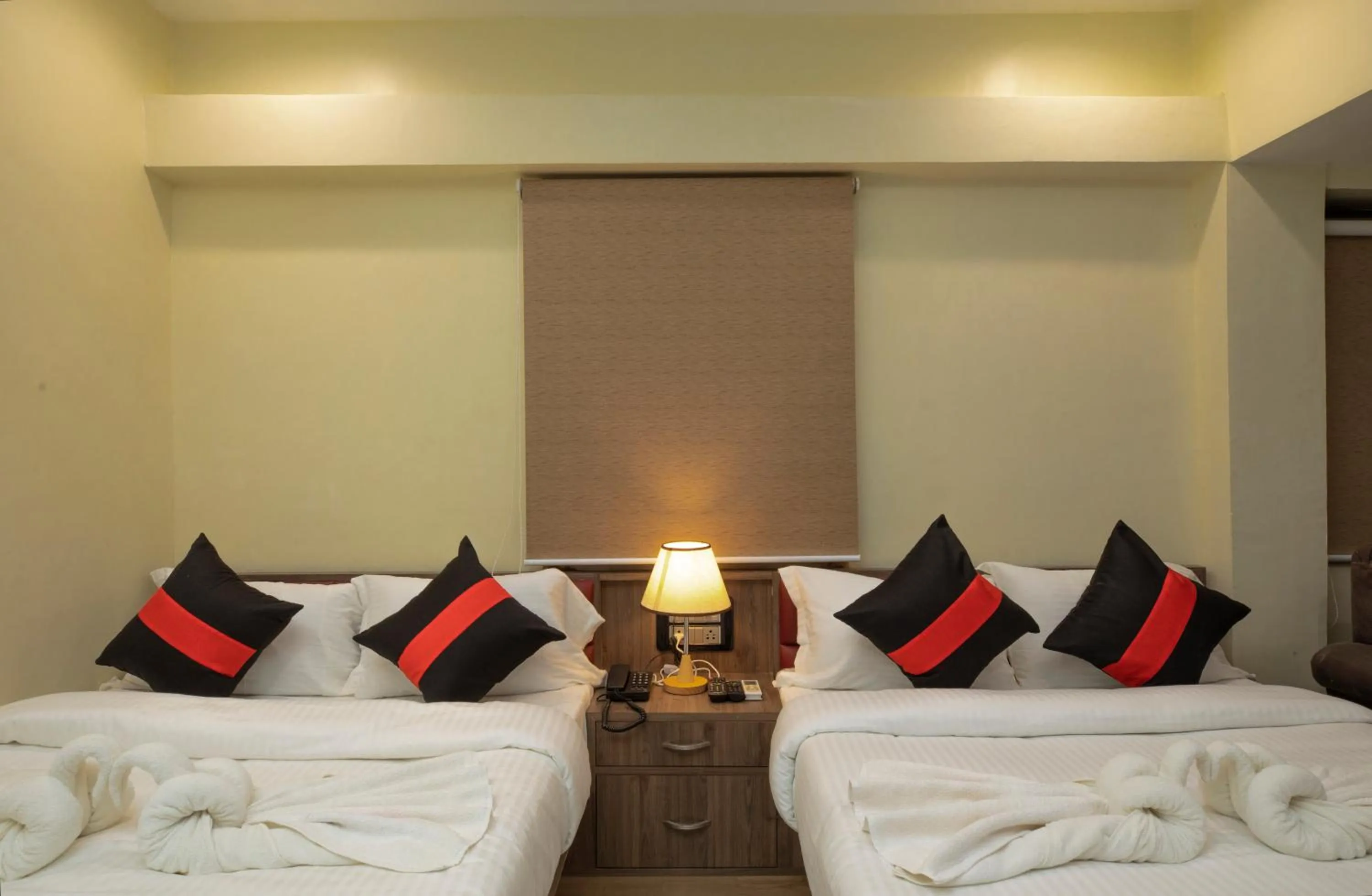 Bed in Snehamaya Spa & Resort