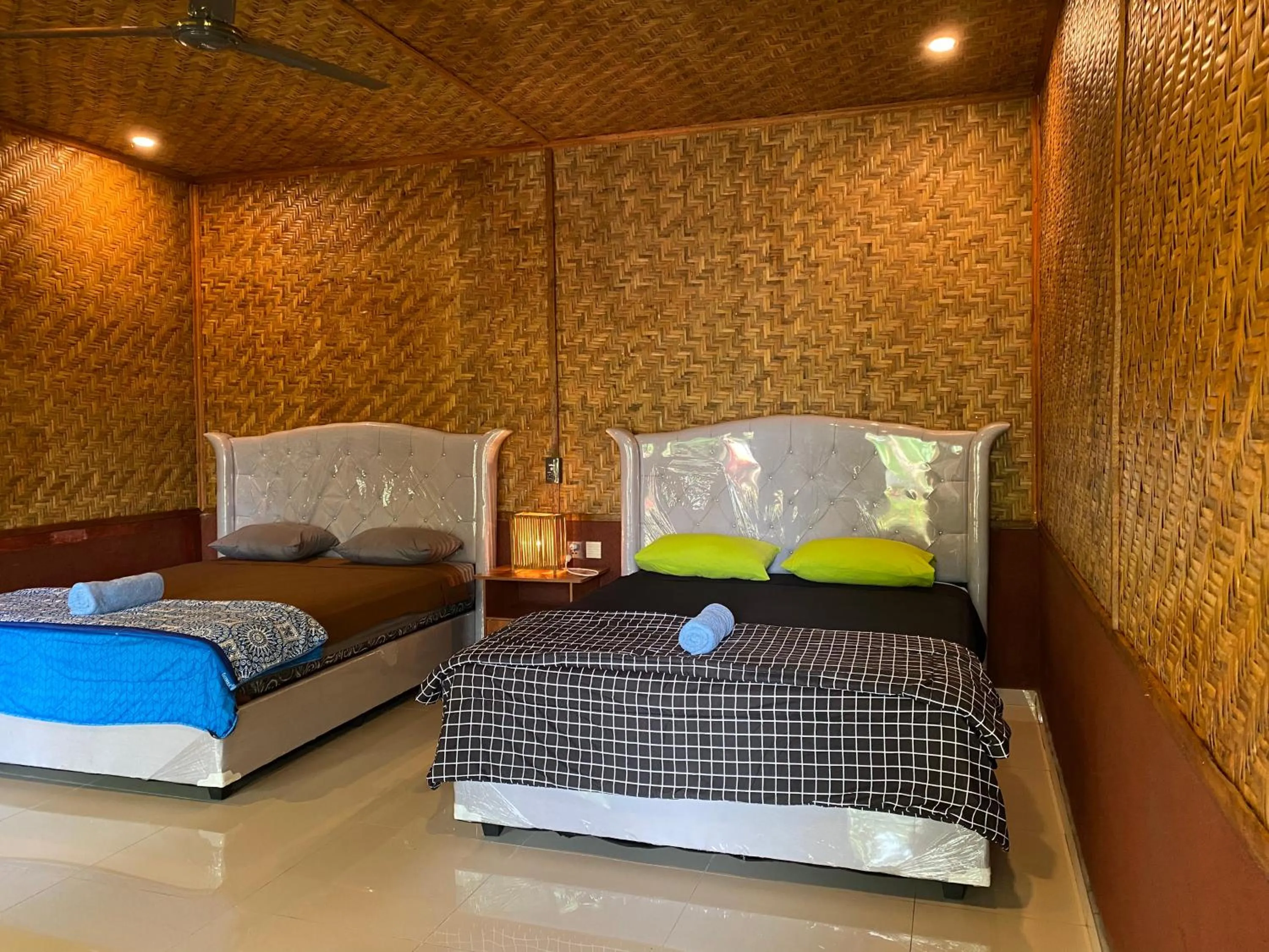 Bed in Wina Wani Bungalows Tetebatu