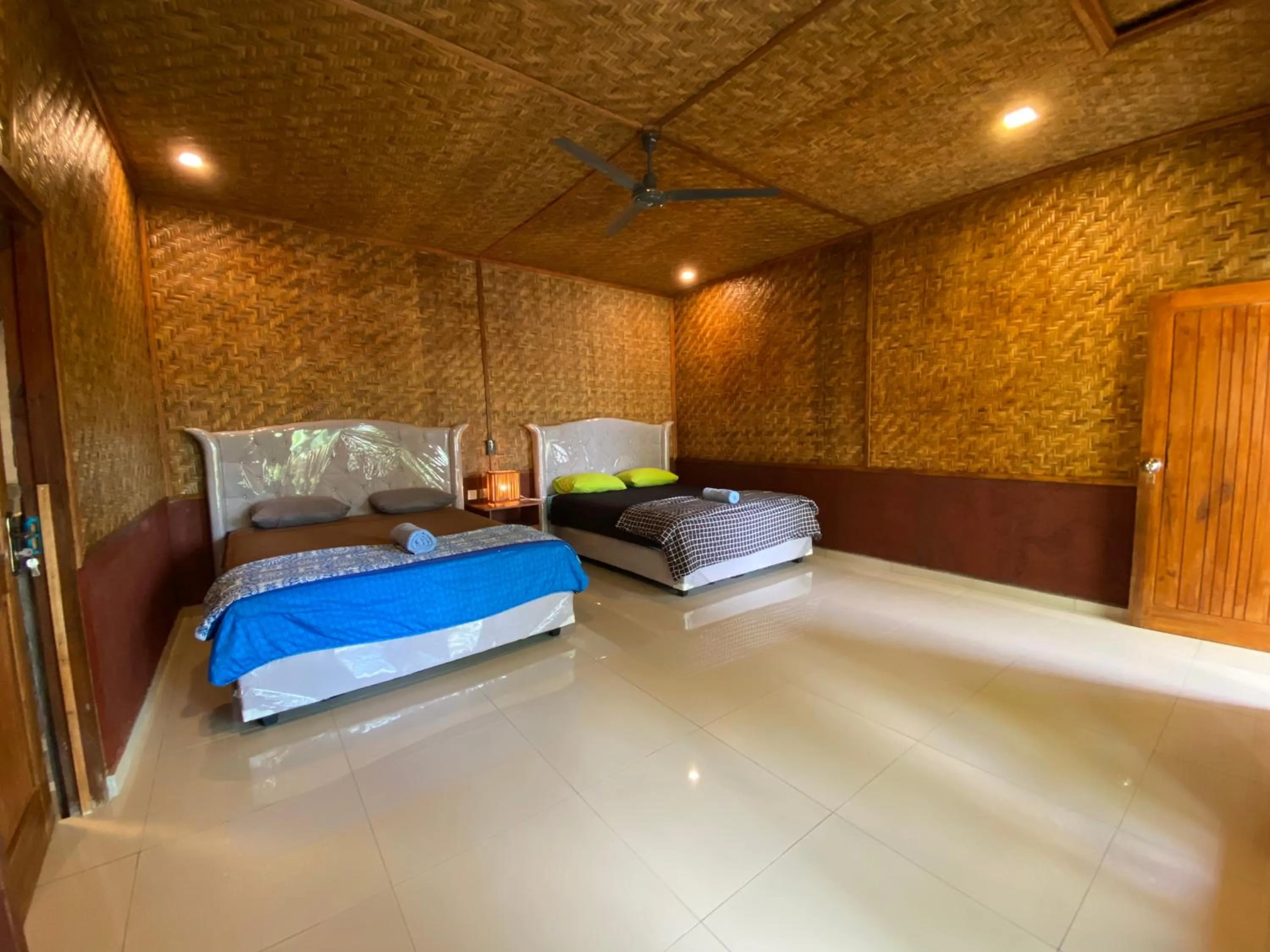 Bed in Wina Wani Bungalows Tetebatu