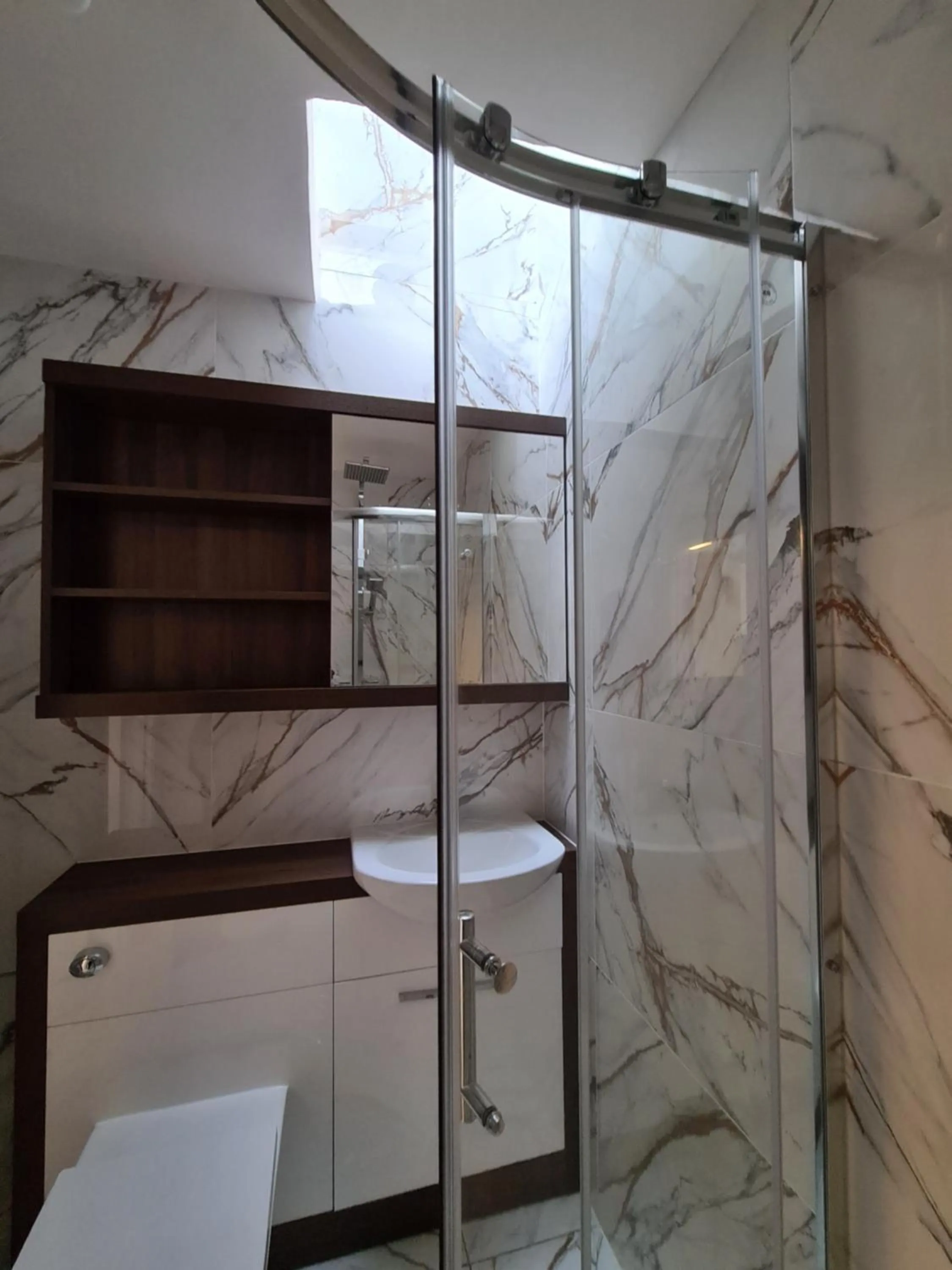 Shower in Umbrella Properties London Excel