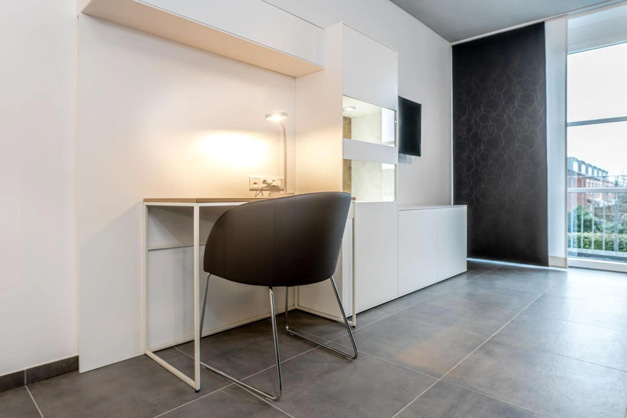 Communal lounge/ TV room in Refugium am Wasserturm