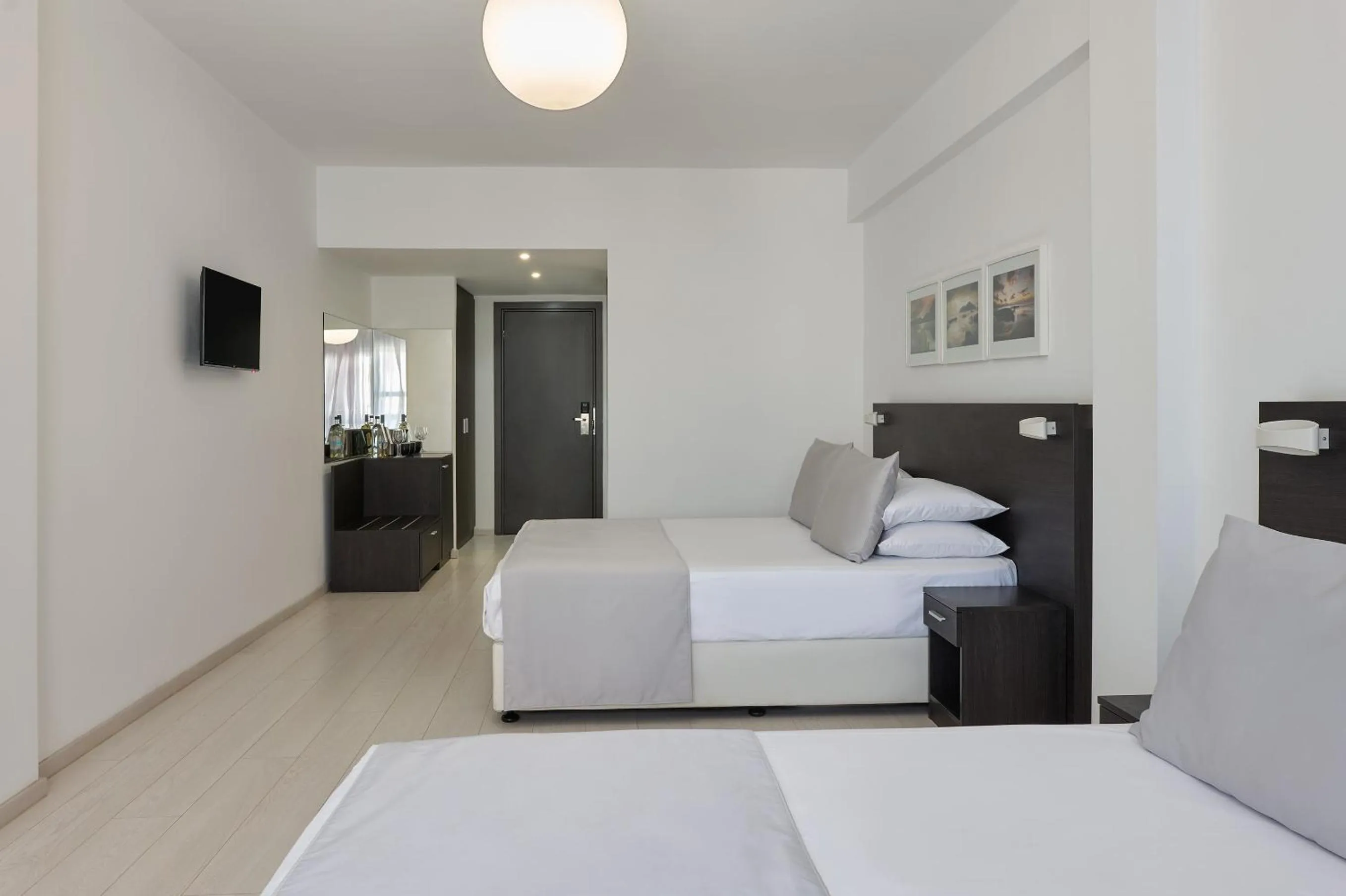 Bed in Boss Boutique Athens by Prima Hotels