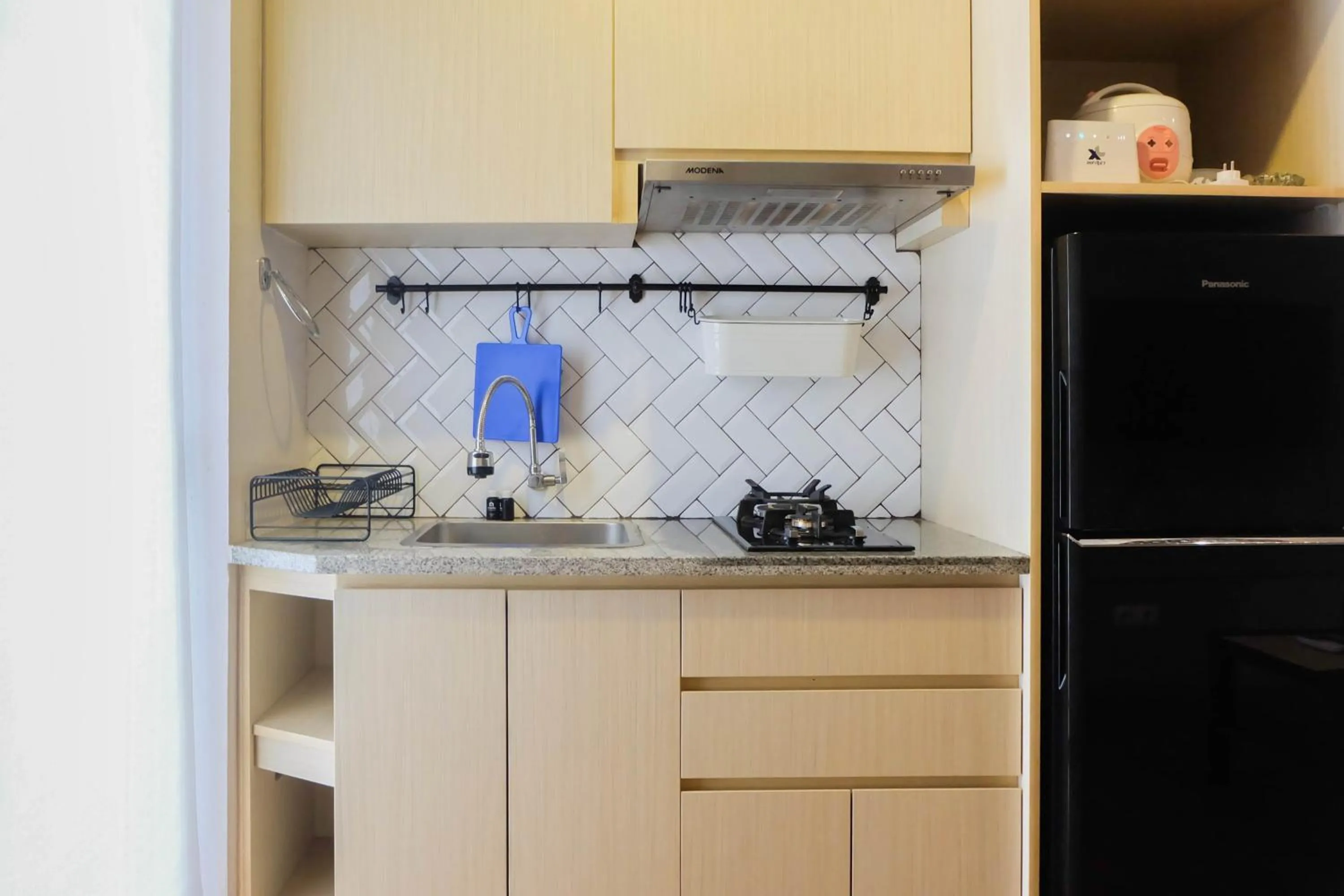 Exclusive and Spacious 1BR Apartment at Bassura City By Travelio