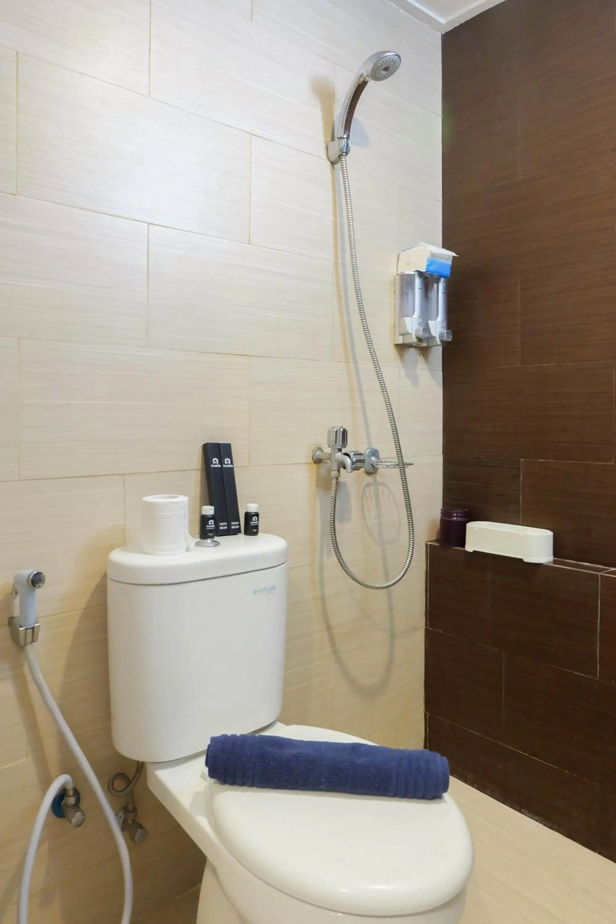 Exclusive and Spacious 1BR Apartment at Bassura City By Travelio