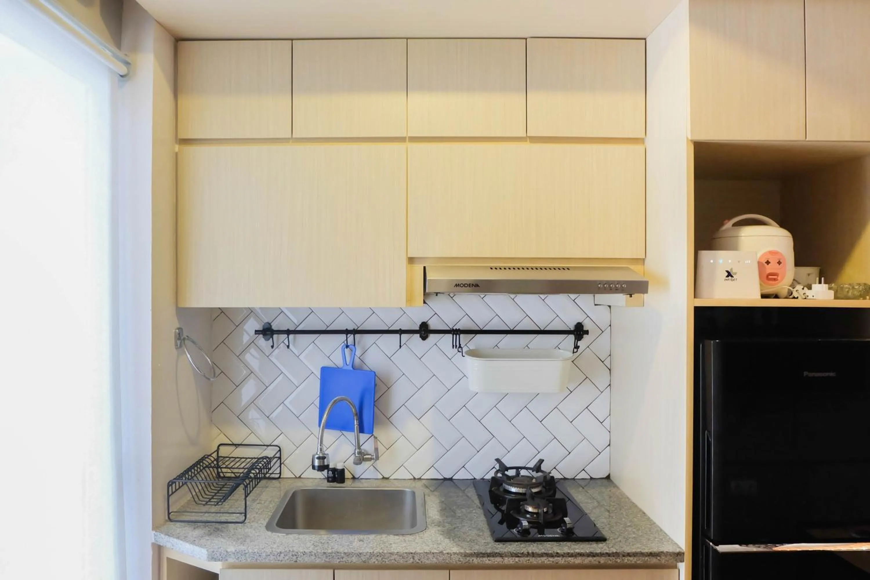 Exclusive and Spacious 1BR Apartment at Bassura City By Travelio