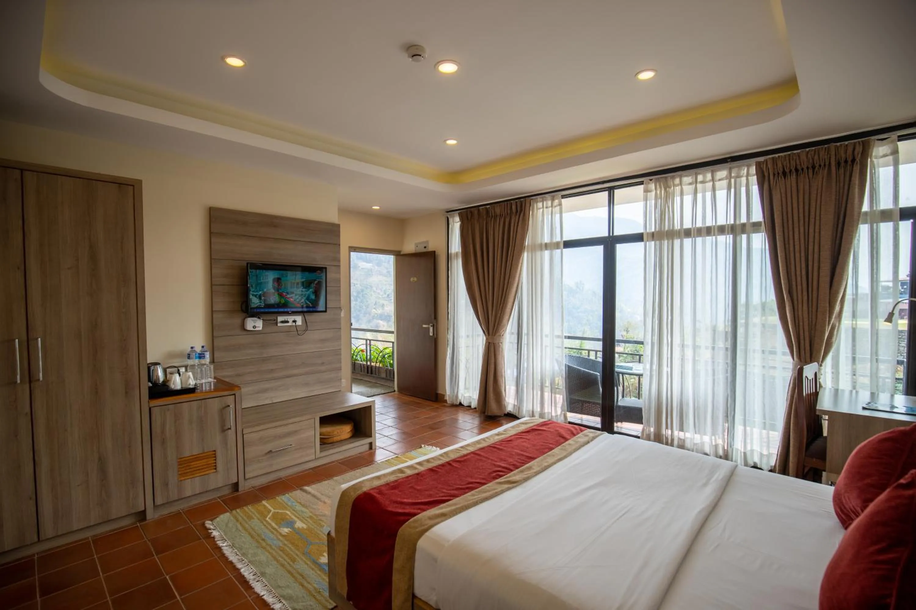 TV and multimedia, Bed in Gateway Himalaya Resort