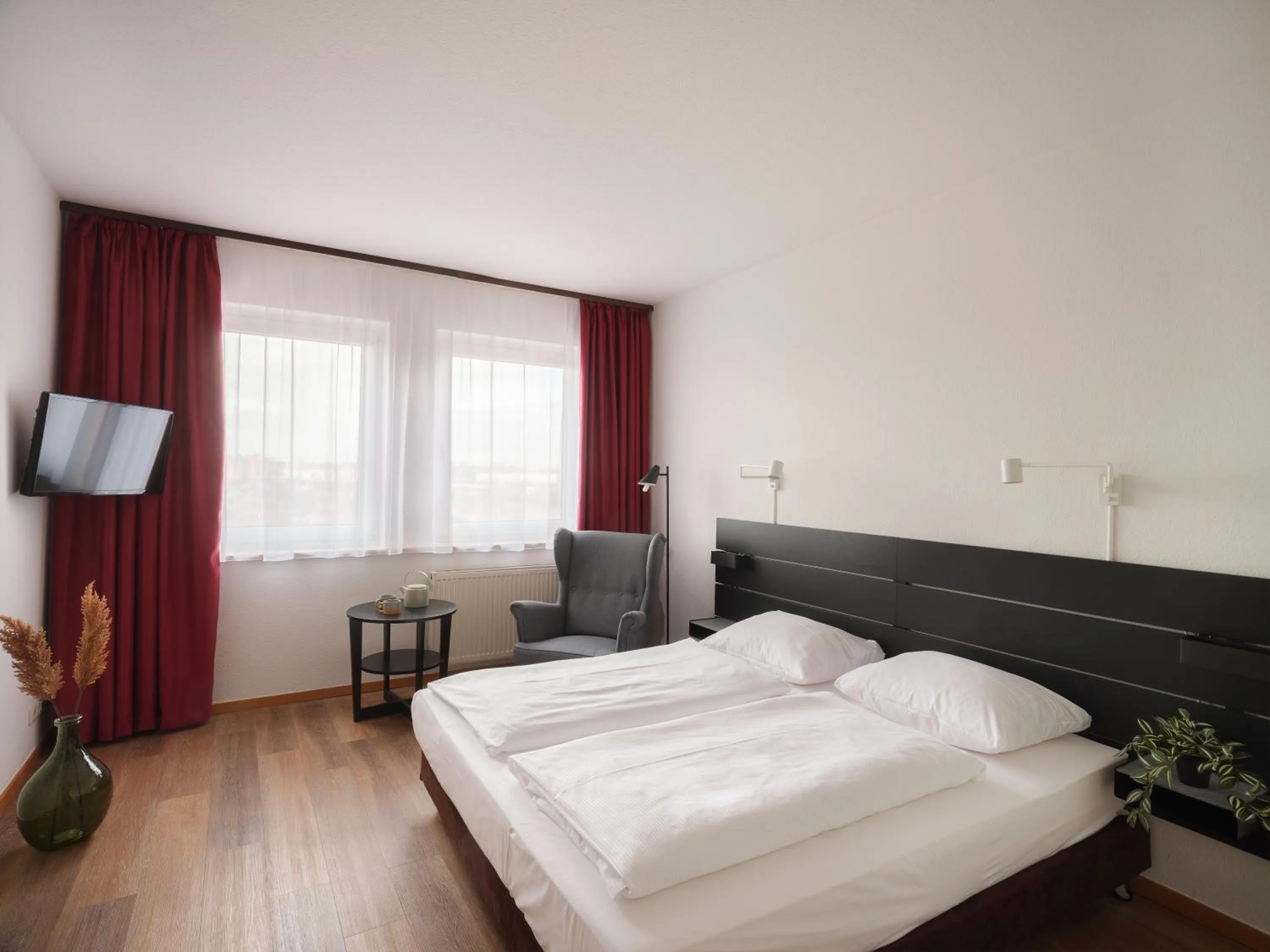 Bed in Mühlenhotel Halle-Leipzig