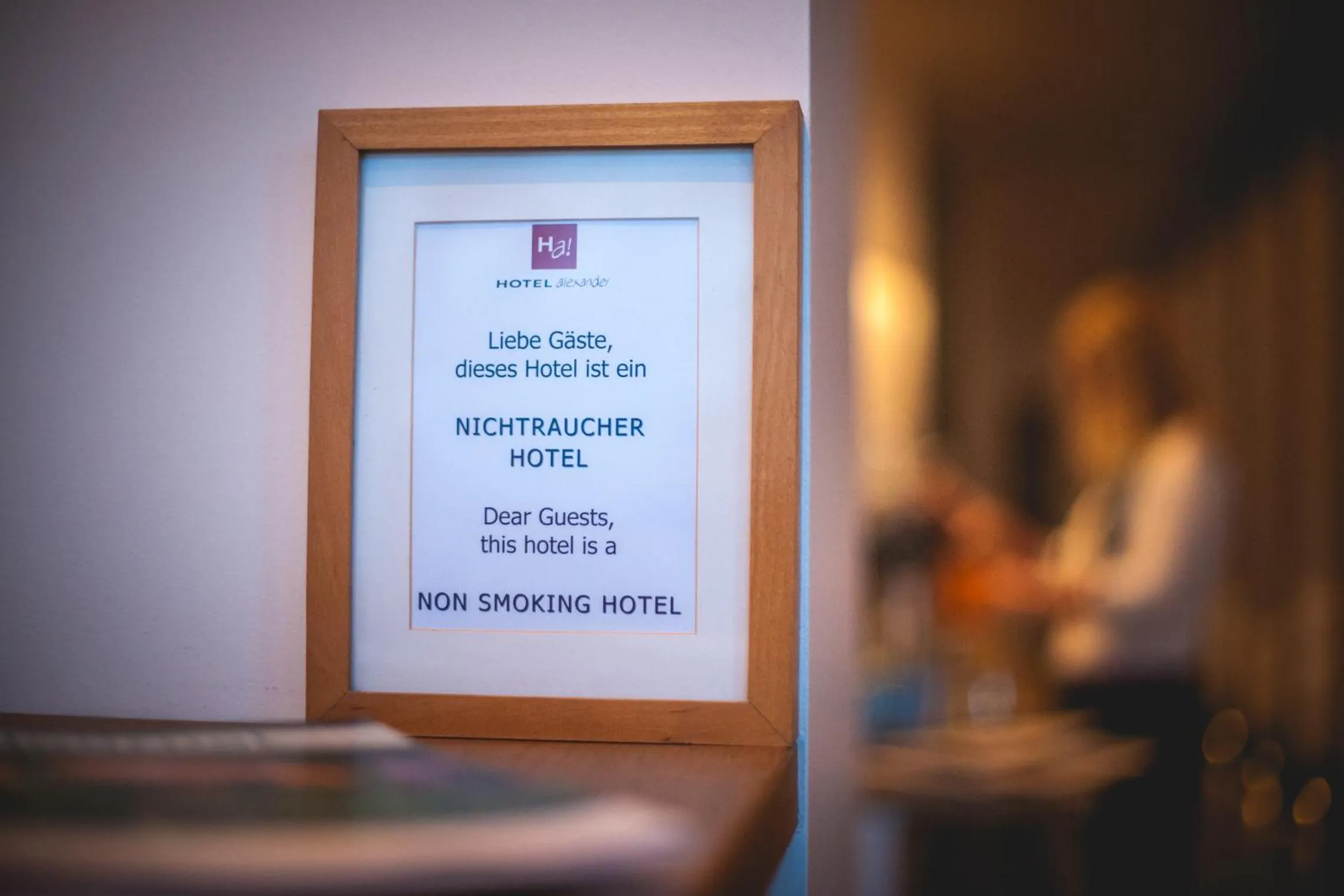 Property logo or sign in Hotel Alexander