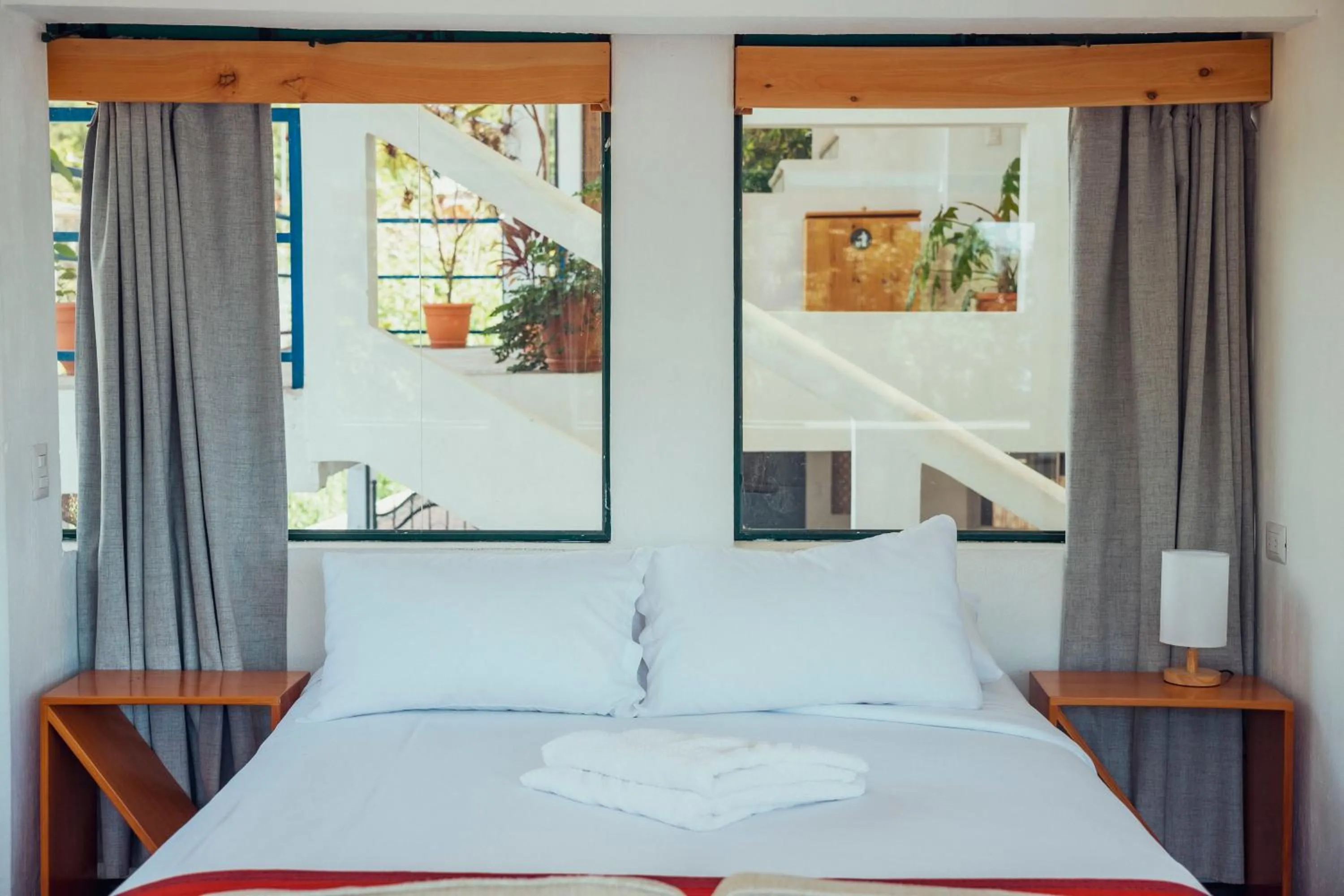 Bed in El Dragon Hotel