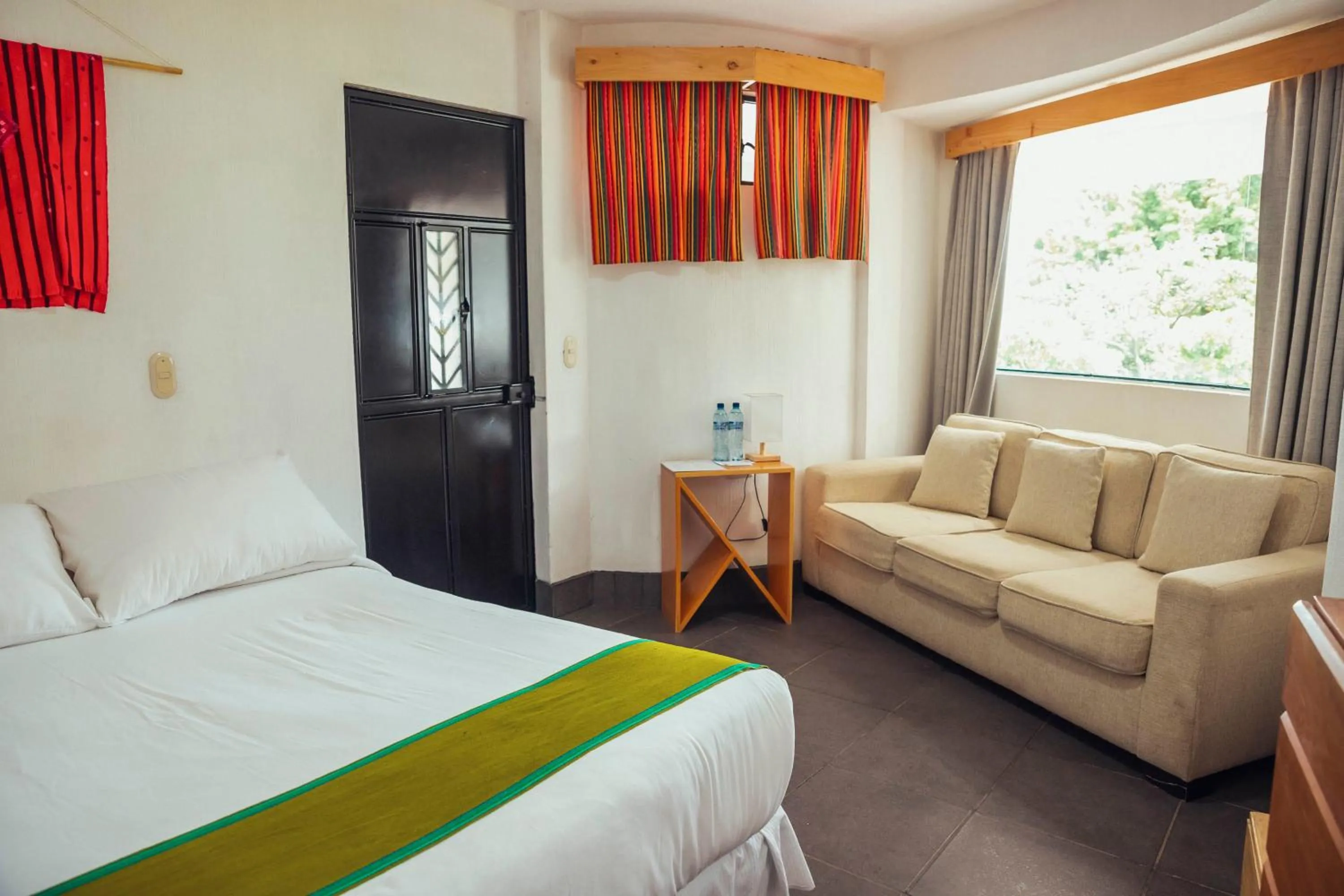 Bed in El Dragon Hotel