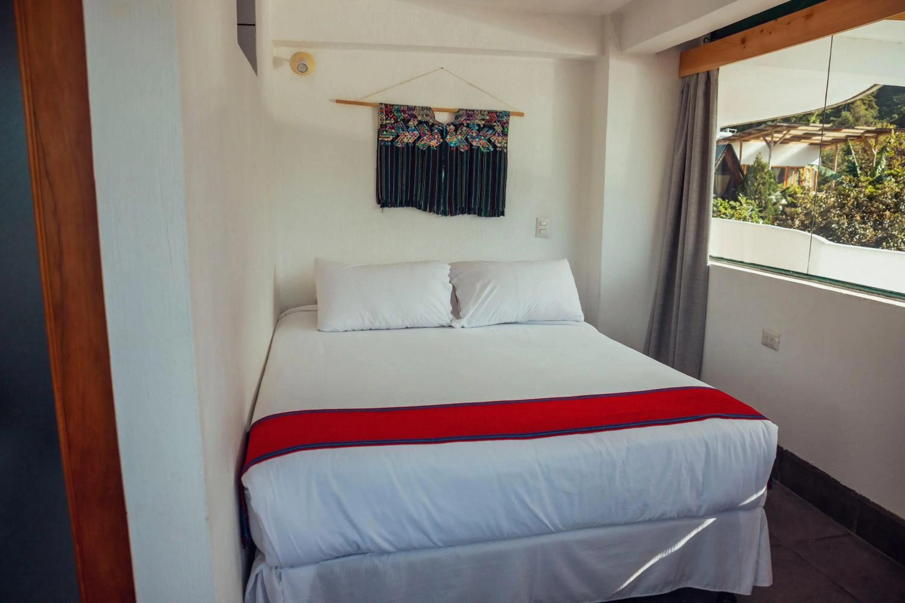 Bed in El Dragon Hotel