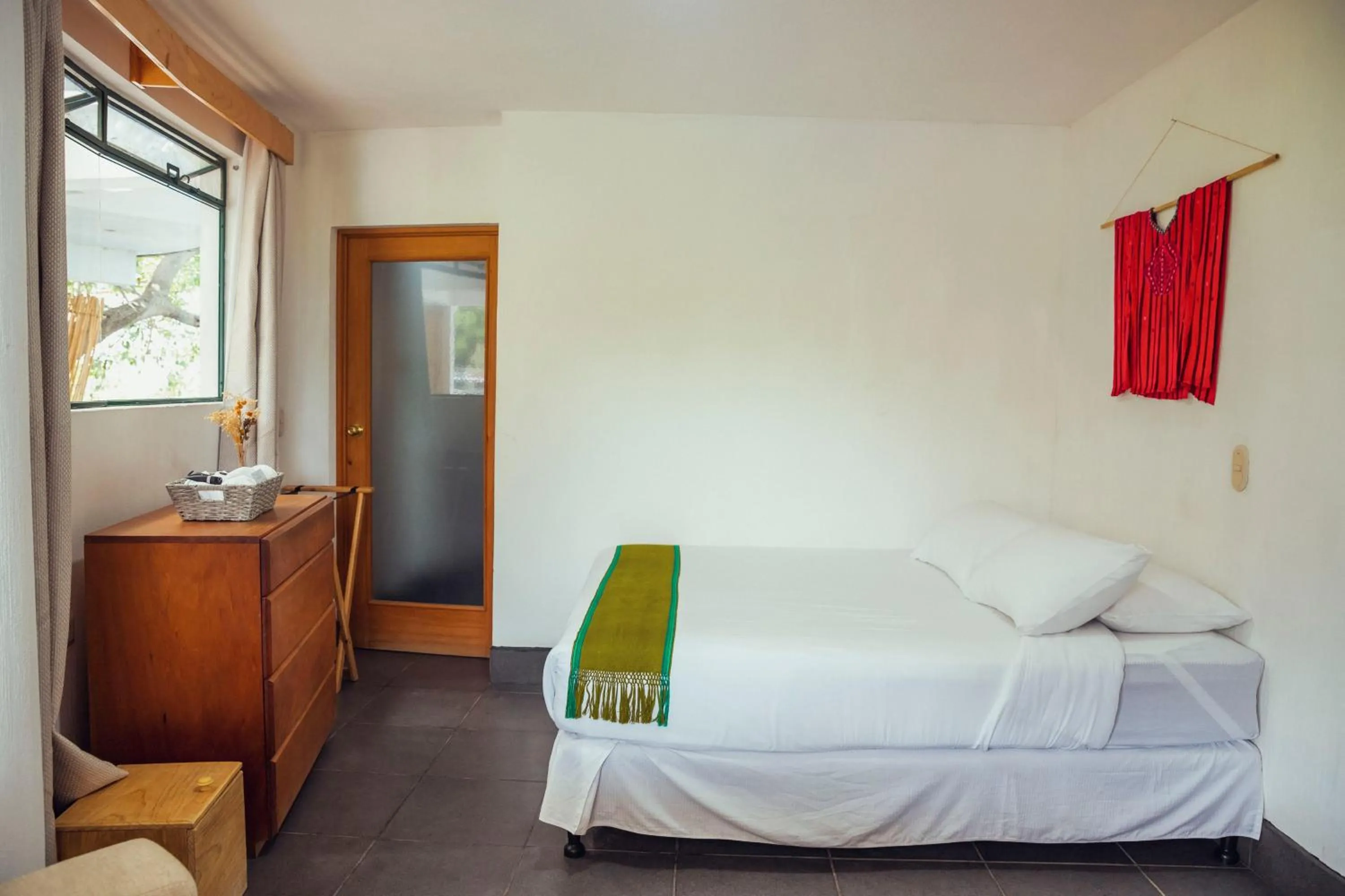 Bed in El Dragon Hotel