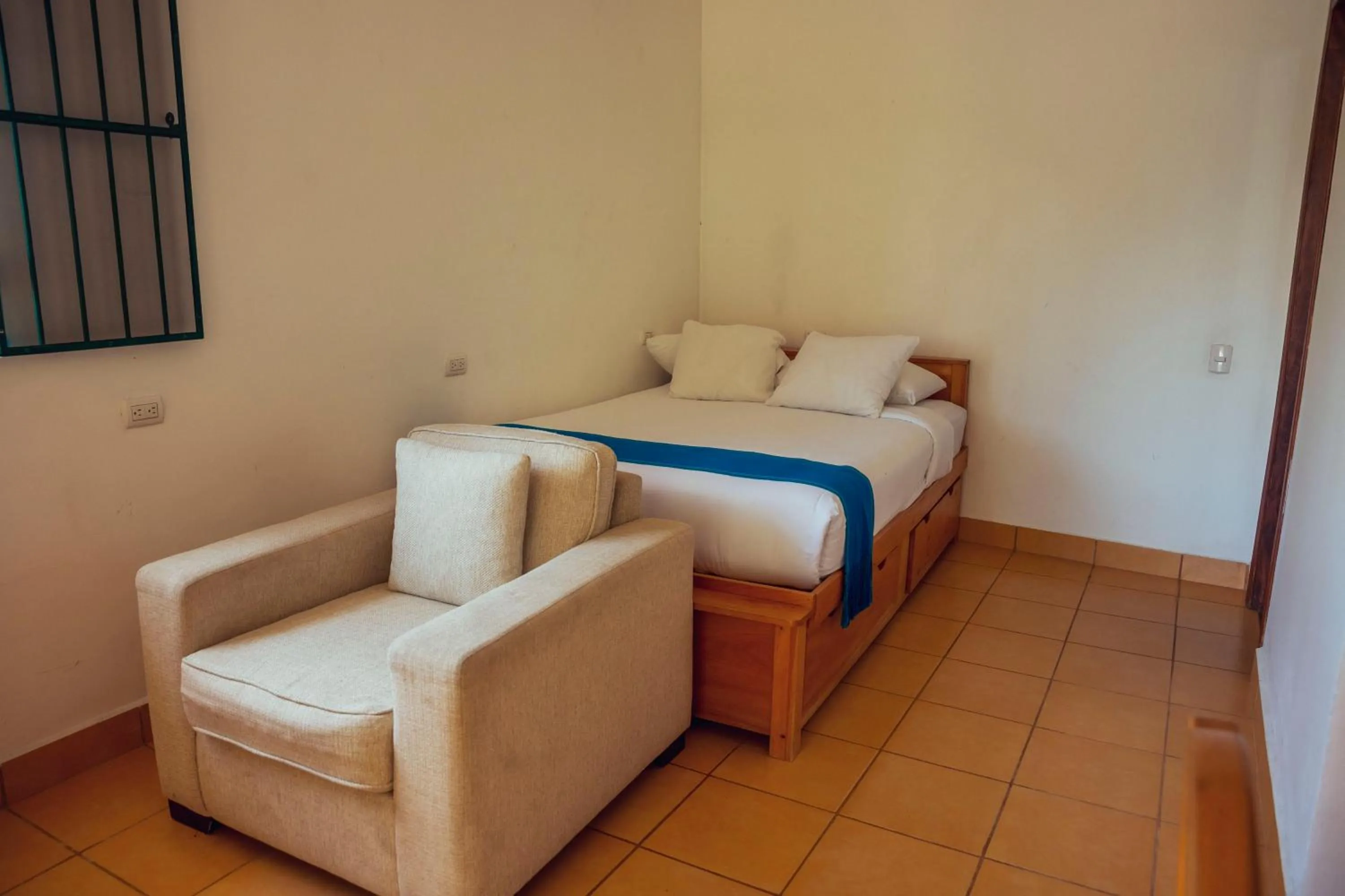 Bed in El Dragon Hotel