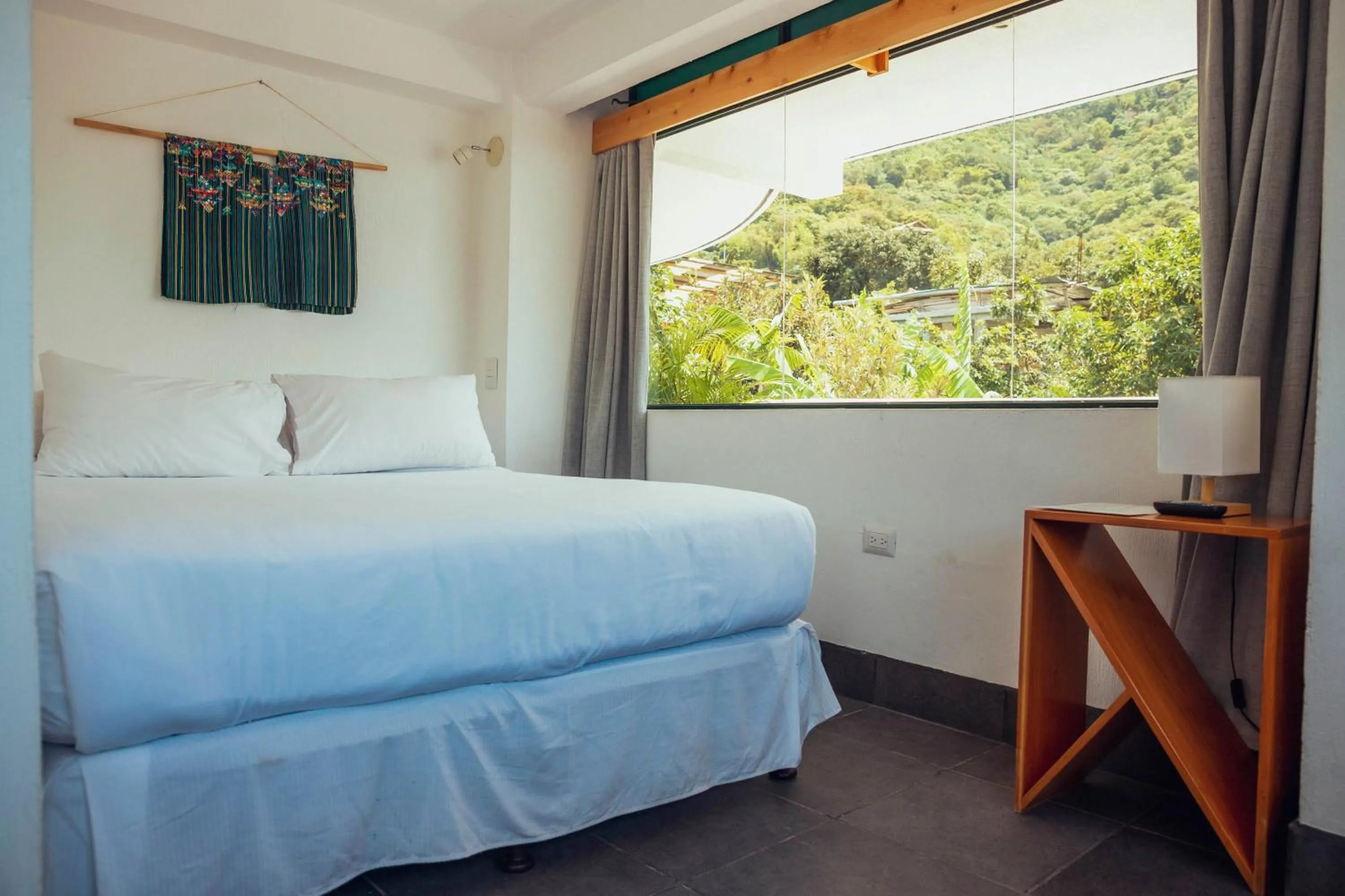 Bed in El Dragon Hotel