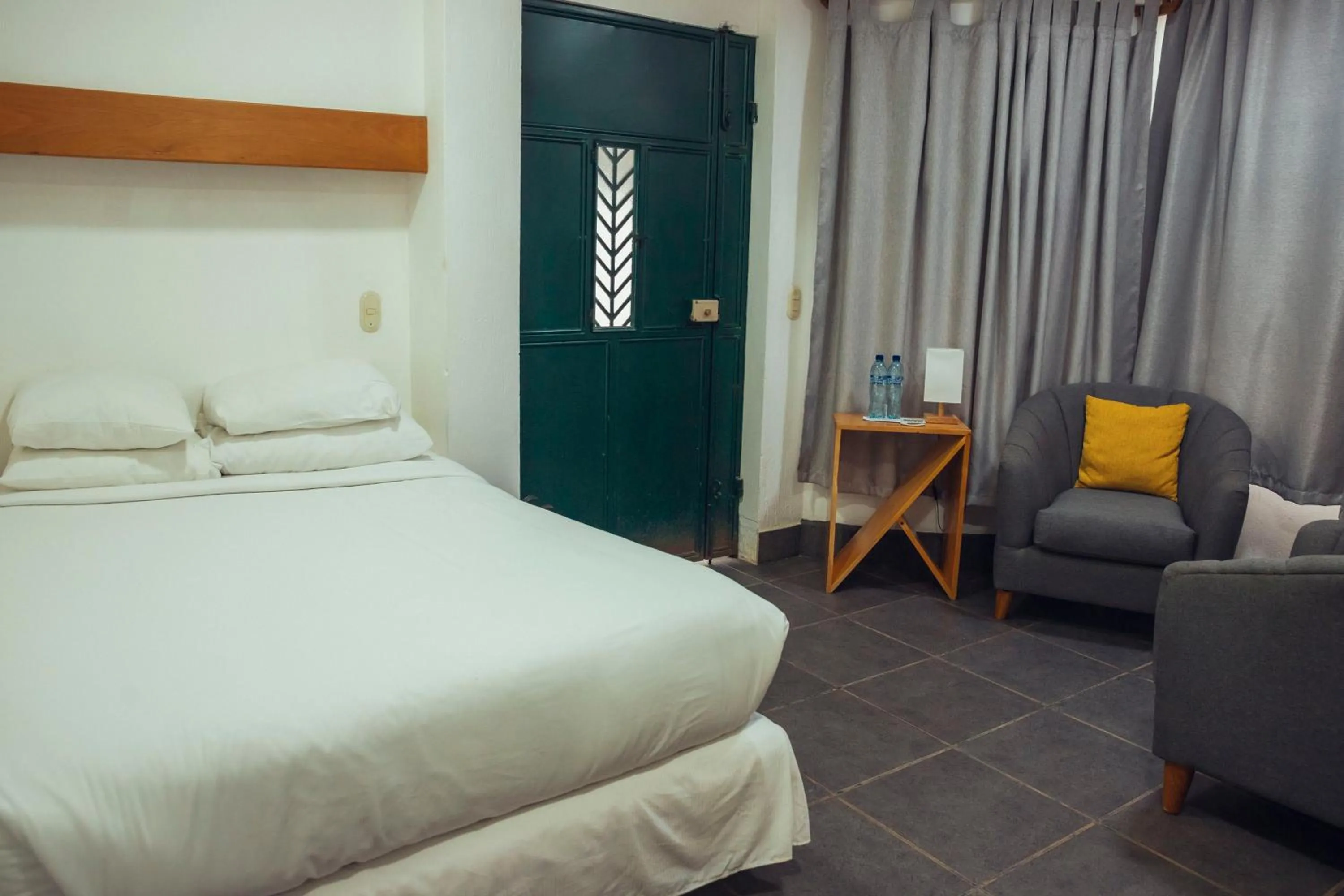 Bed in El Dragon Hotel