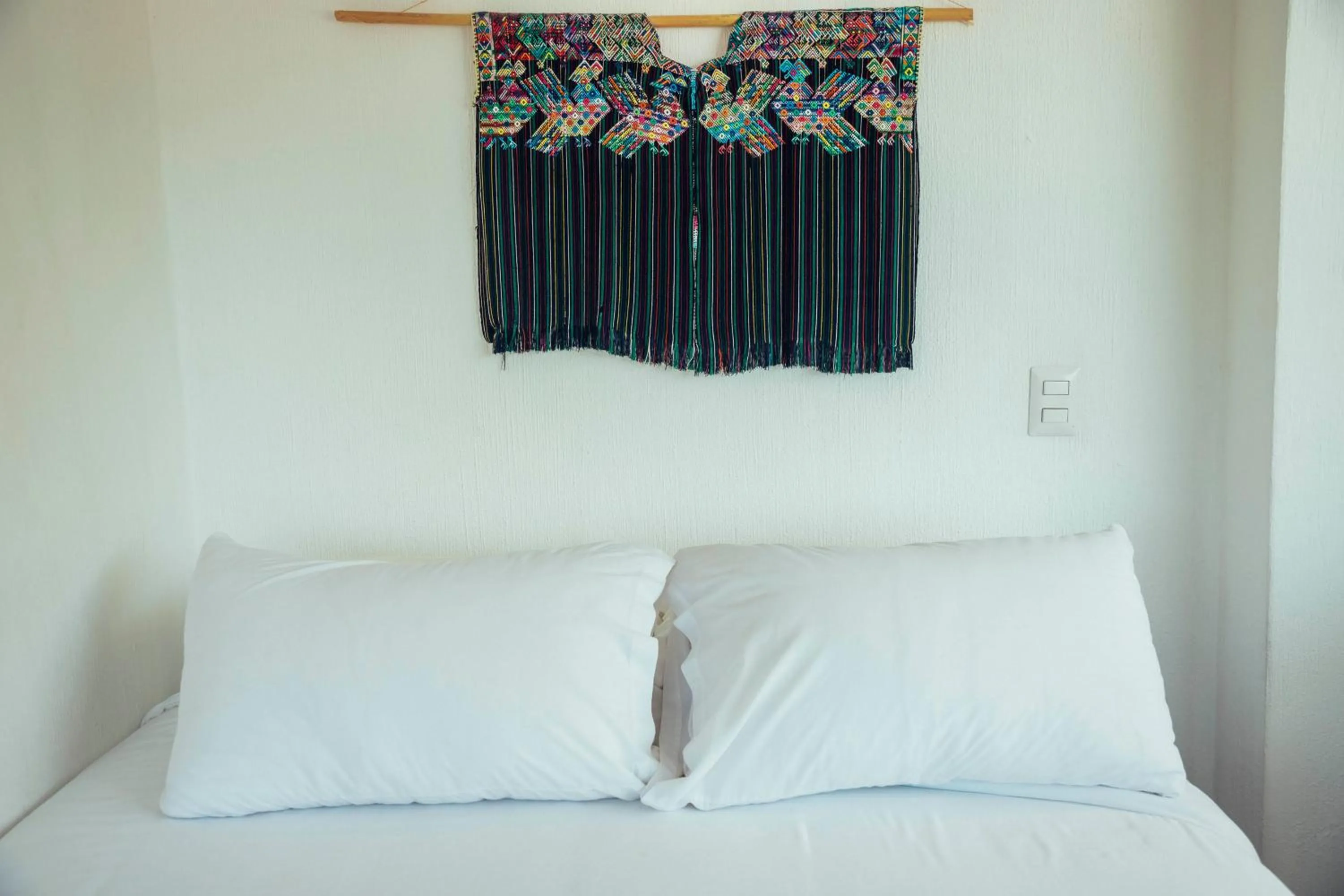 Bed in El Dragon Hotel