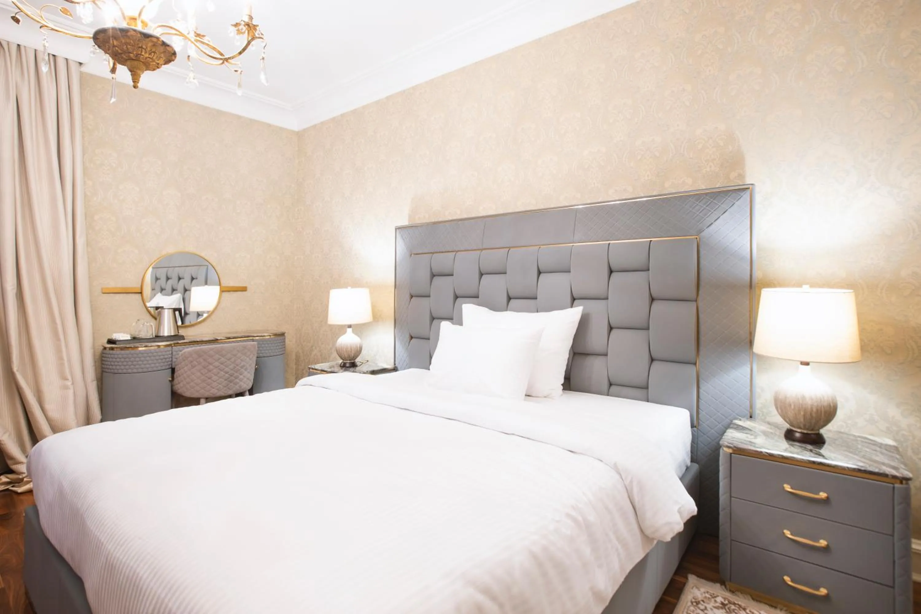 Bed in Eclat Luxury Hotel