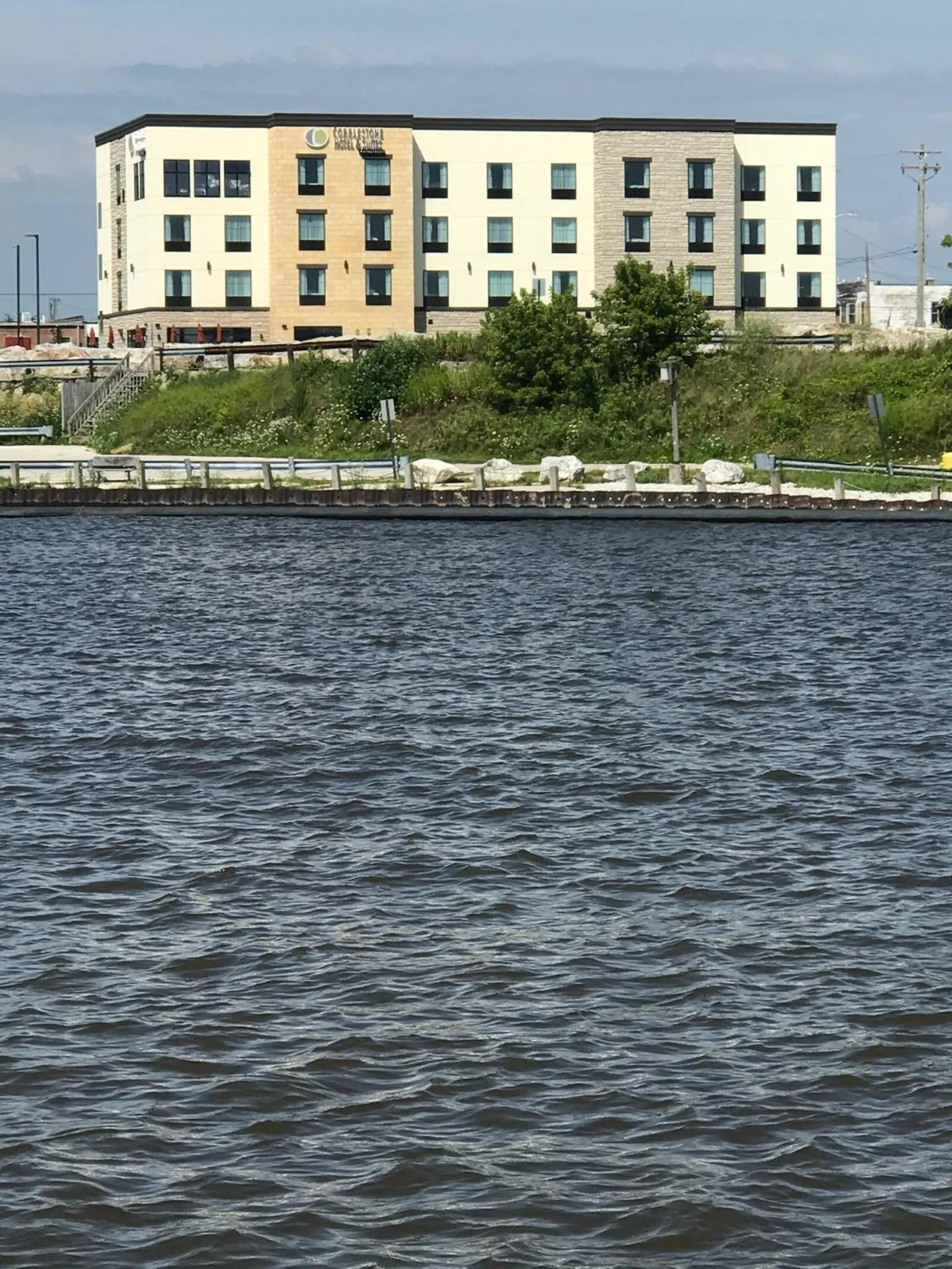 Property building in Cobblestone Hotel & Suites - Two Rivers