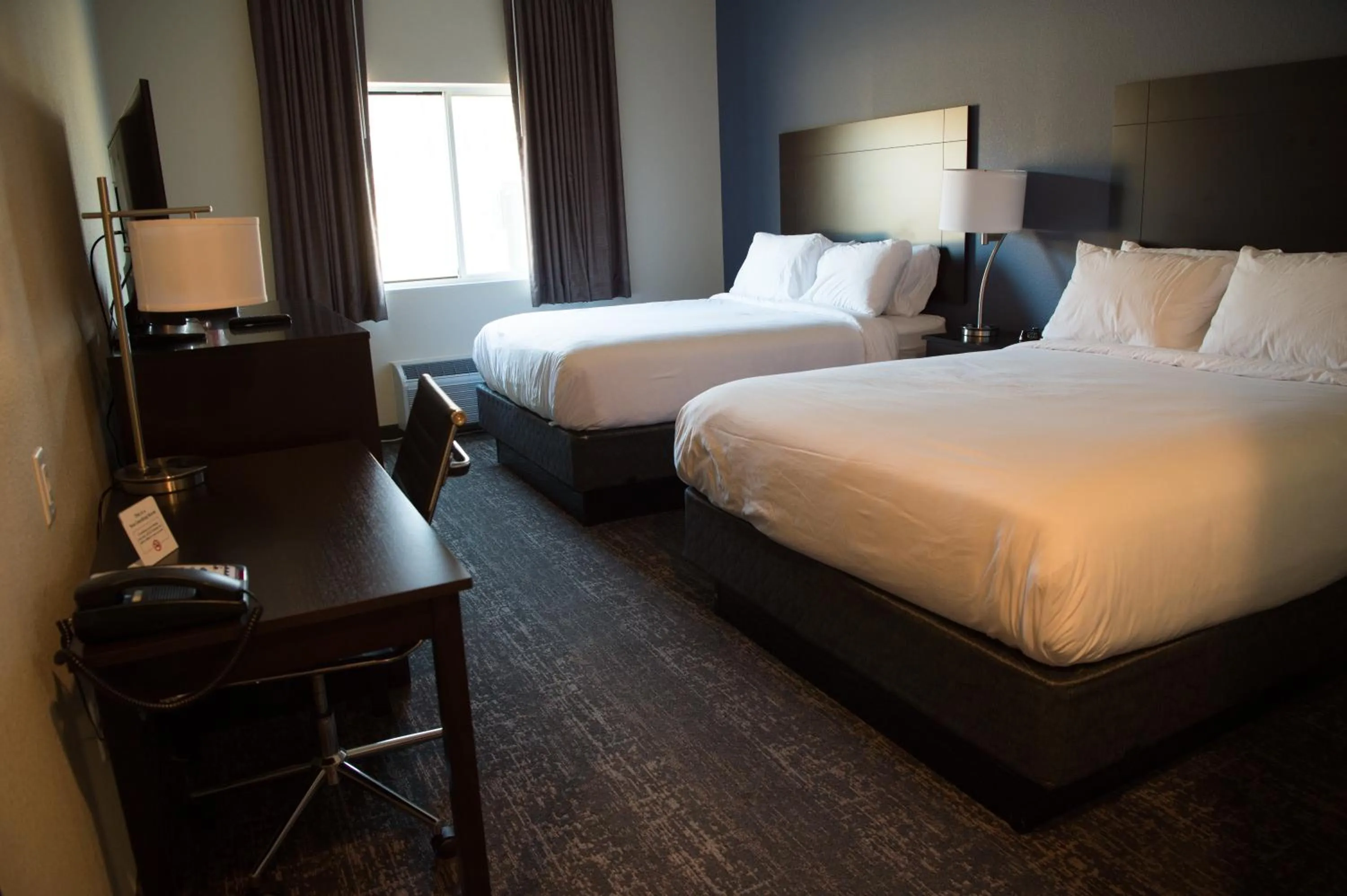 Bed in Cobblestone Inn & Suites - Forest City