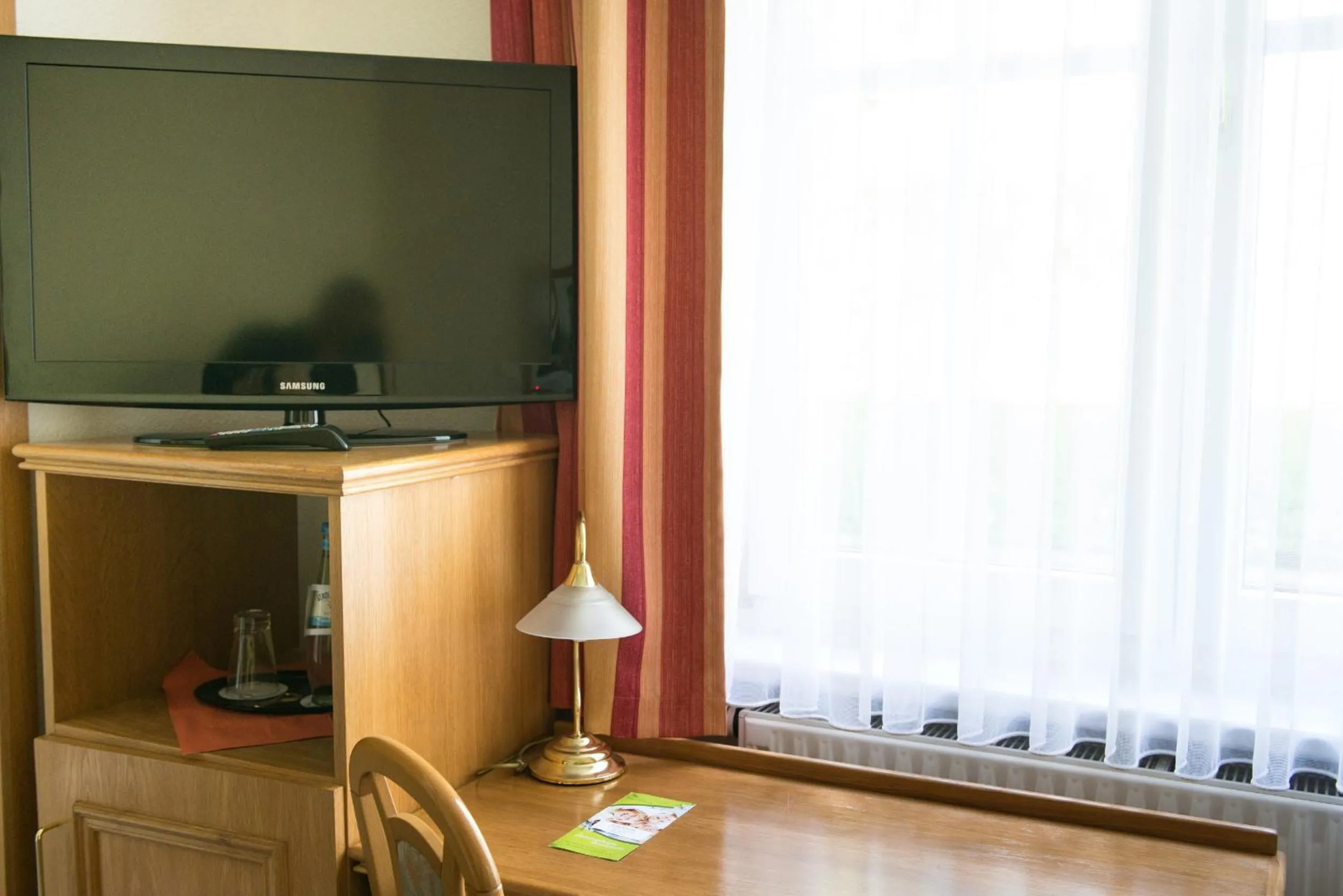 TV and multimedia in Land- und Golfhotel Alte Fliegerschule