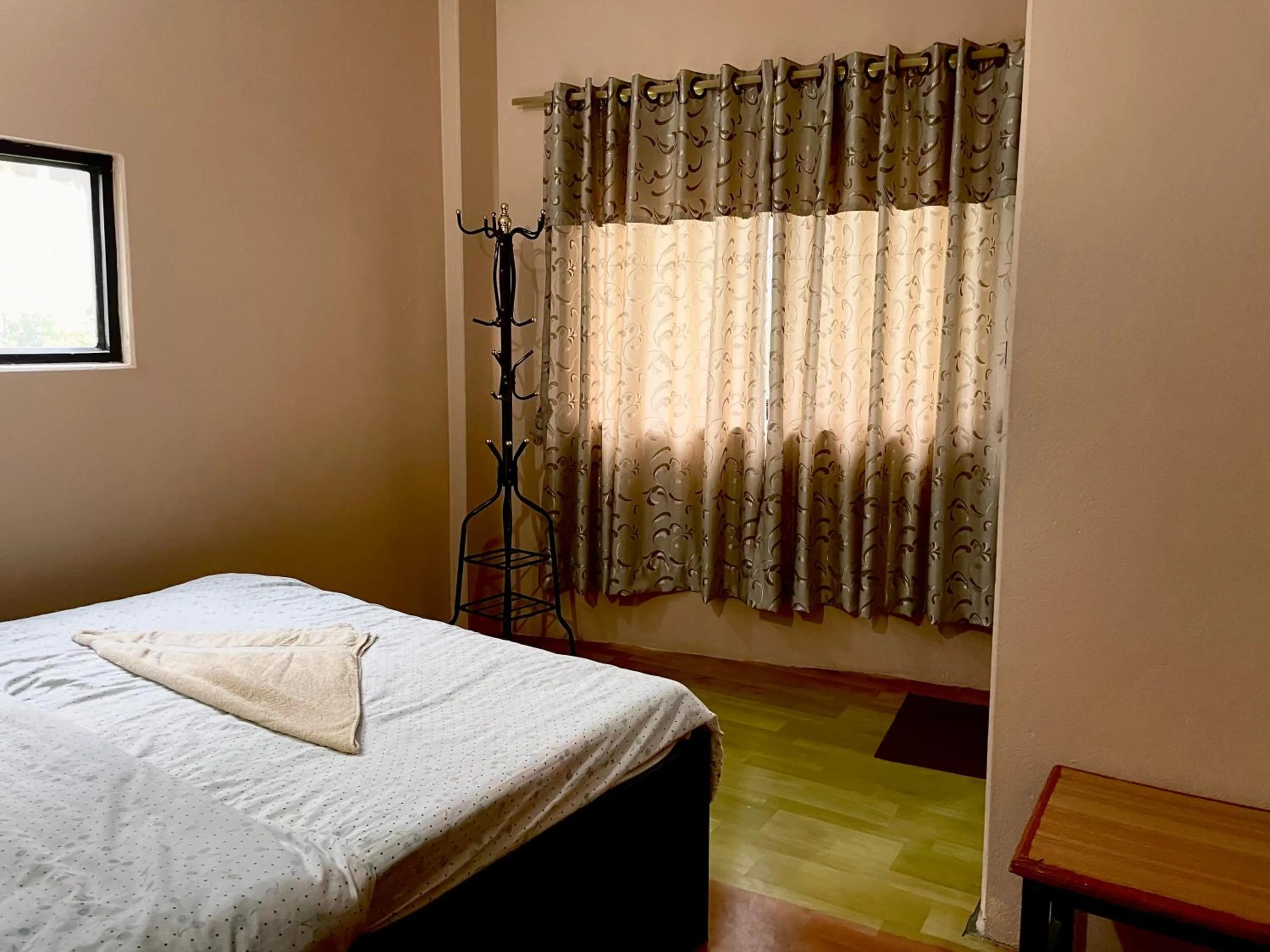 Bed in Yuriko Guest House