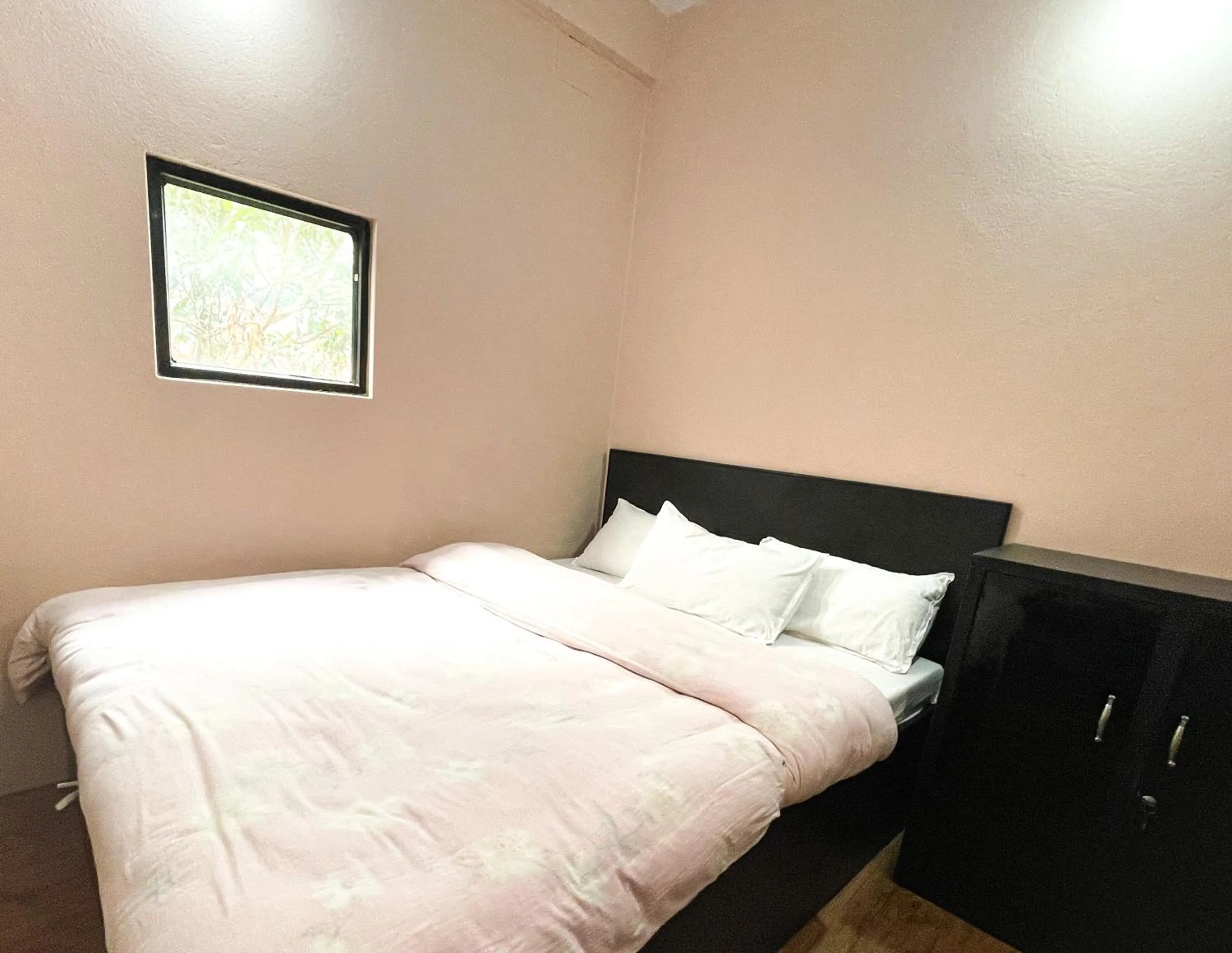 Bed in Yuriko Guest House