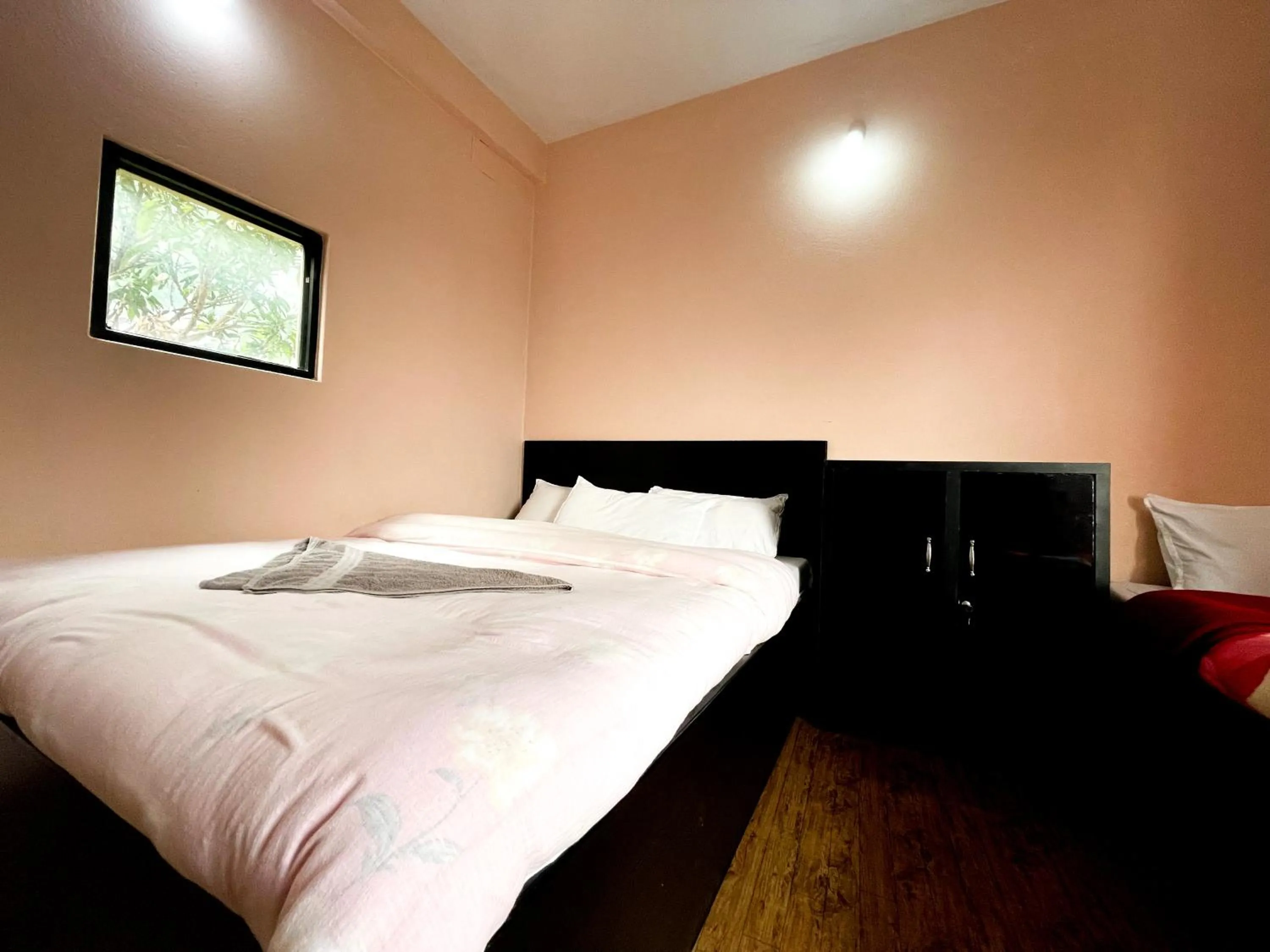 Bed in Yuriko Guest House