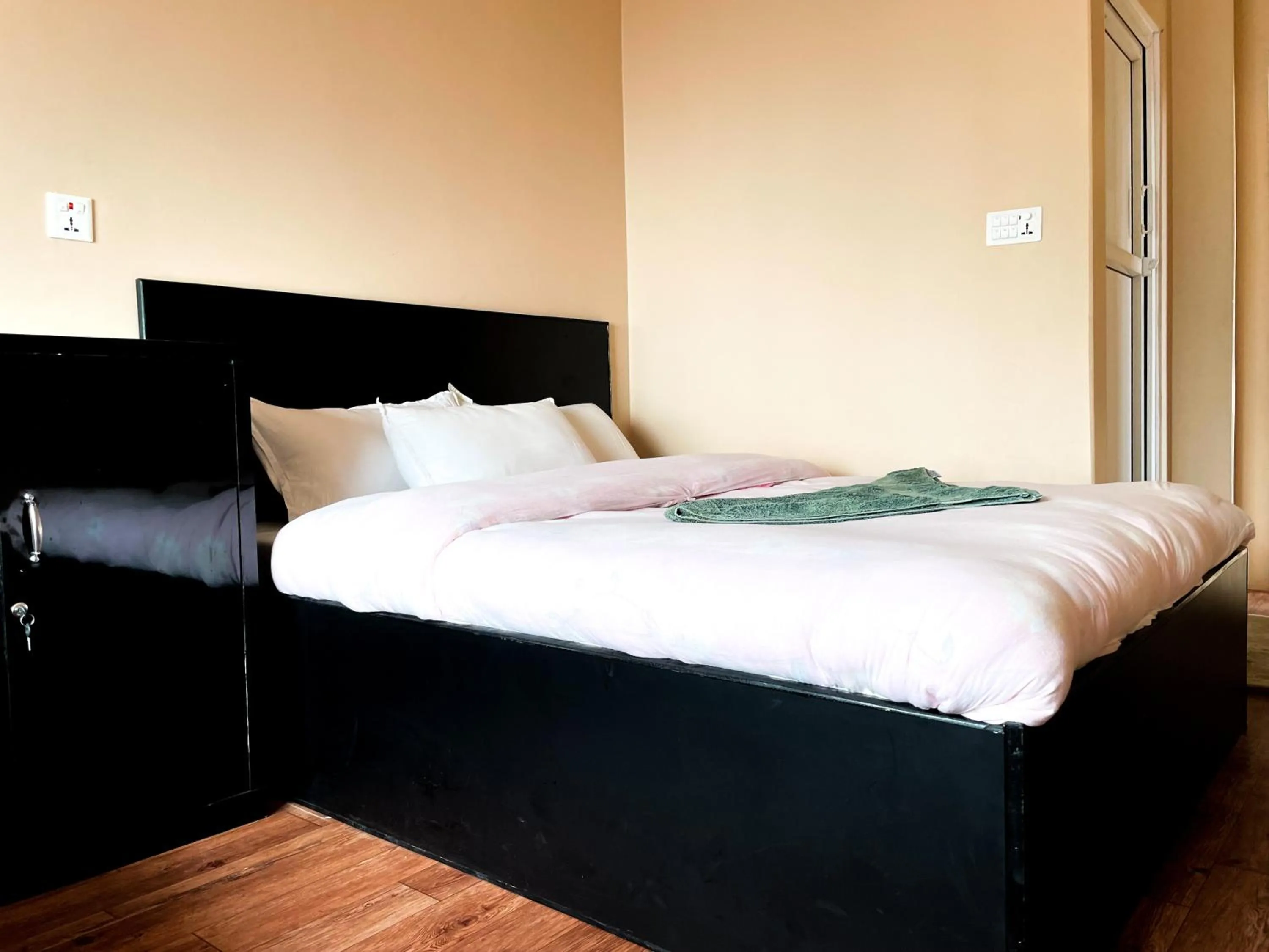 Bed in Yuriko Guest House