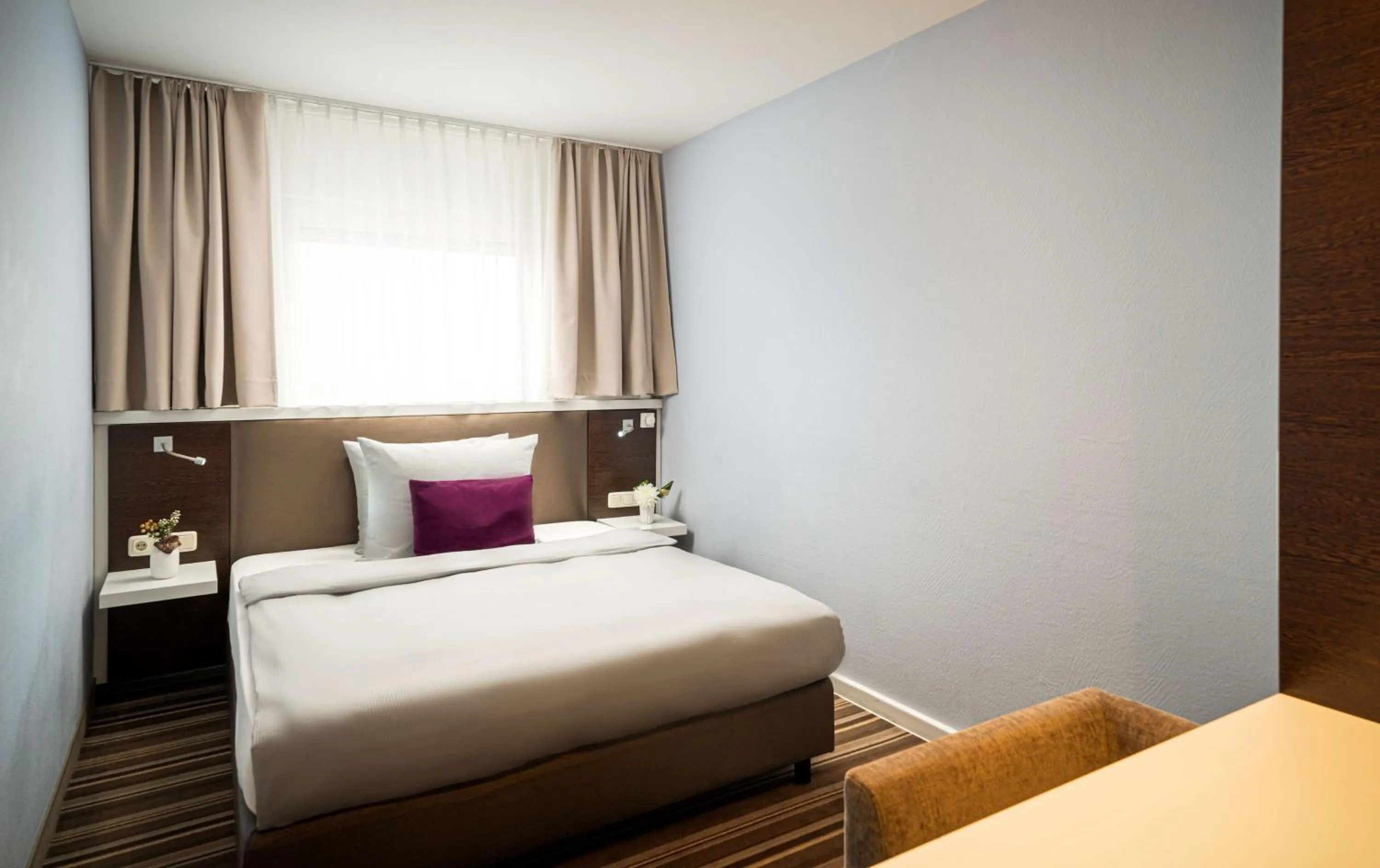 Bedroom in Rilano 24/7 Hotel München