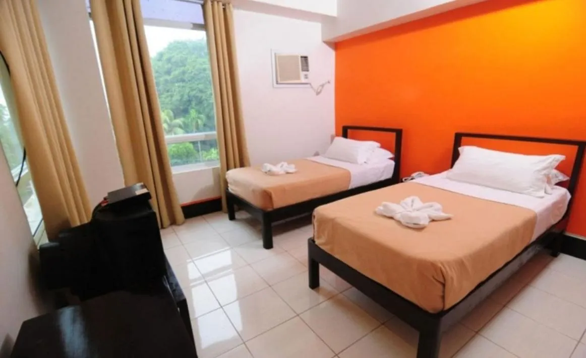 Bed in Negrense Suites