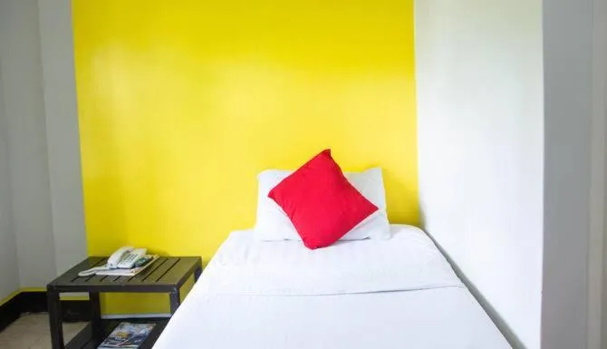 Bed in Negrense Suites