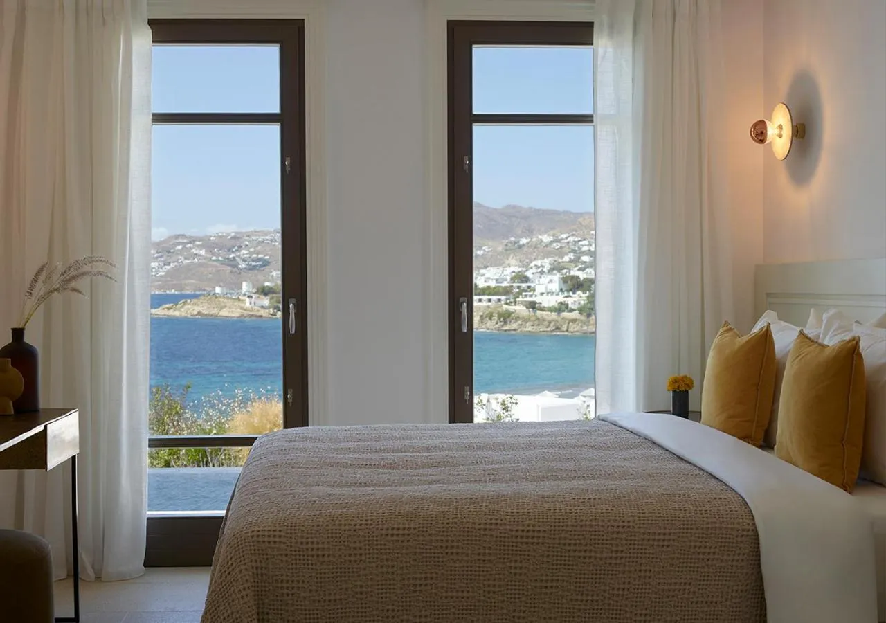 Bedroom, Bed in Bonzoe Suites & Villas