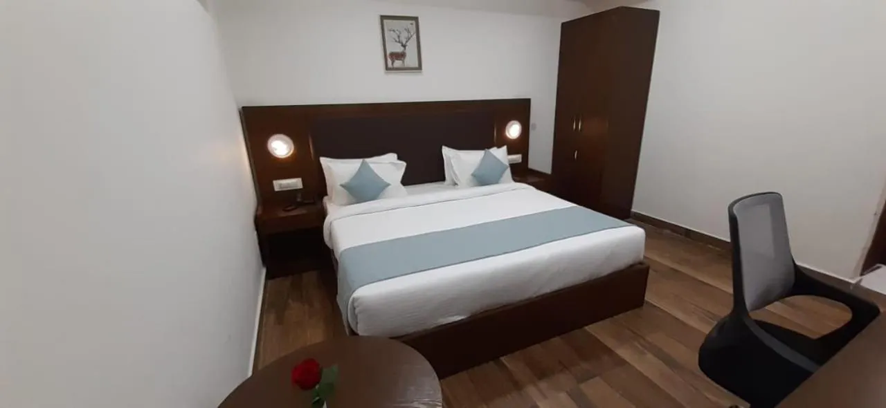 Bed in Aranya Resort by Mrugavani