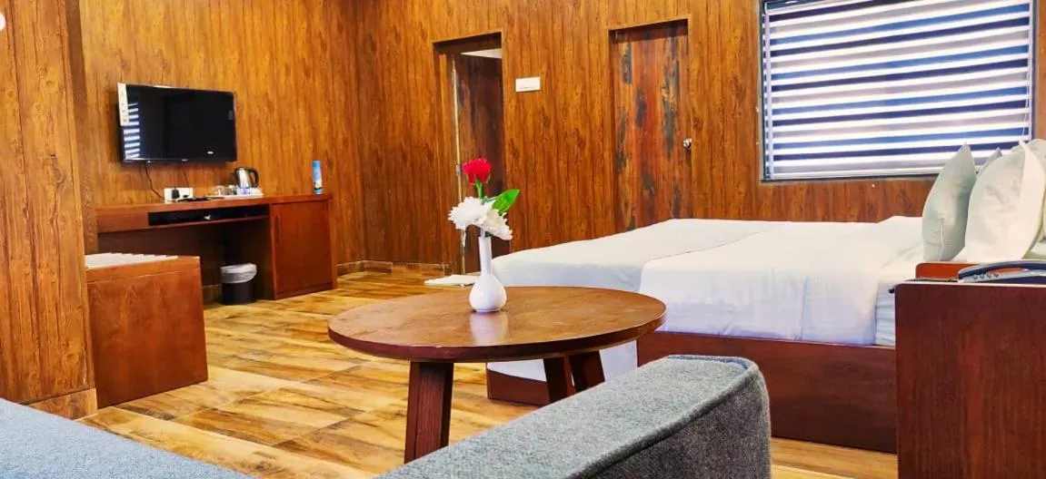 Bed in Aranya Resort by Mrugavani